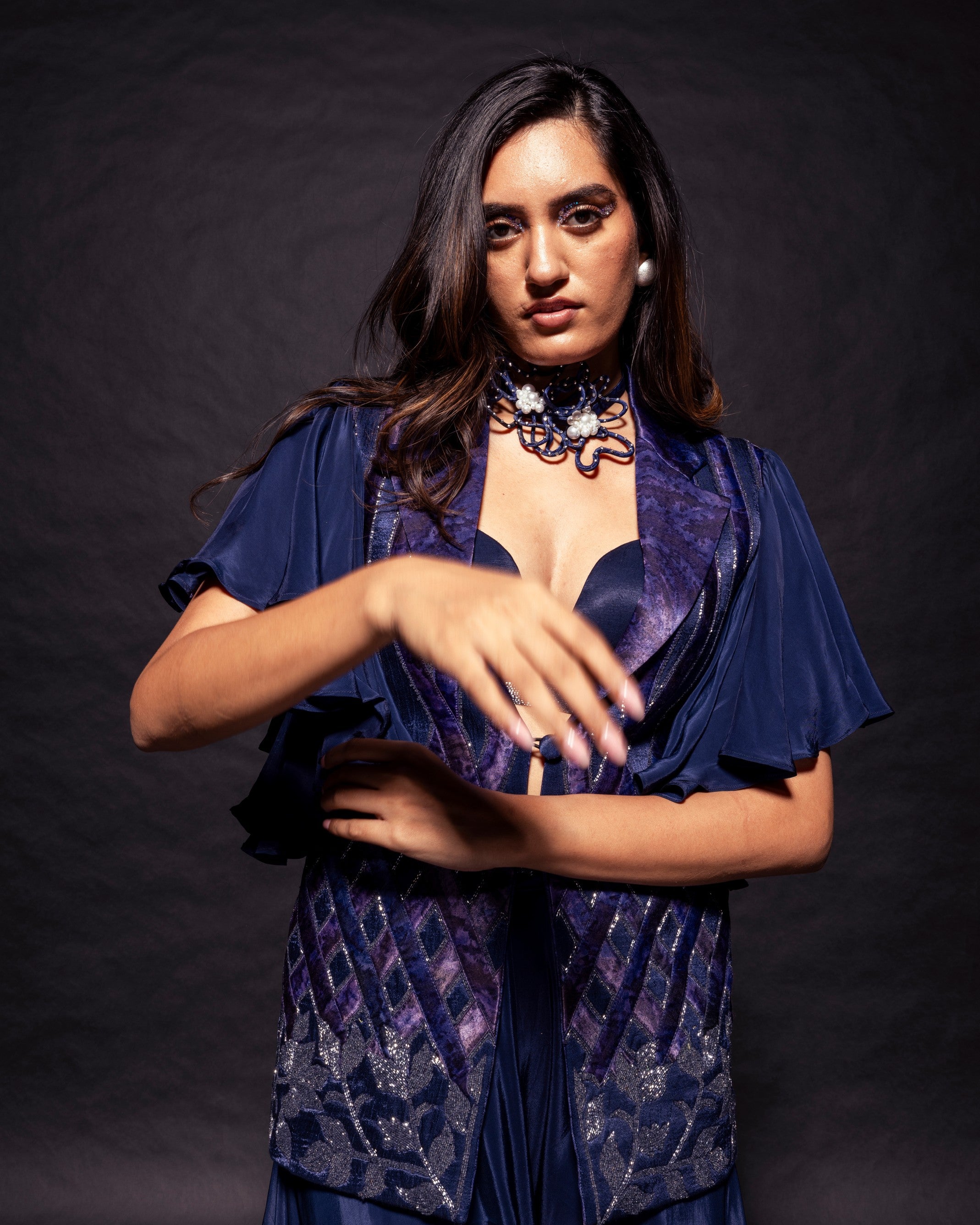 Deep blue ajrakh embellished jacket with embellished brallete and flare pants