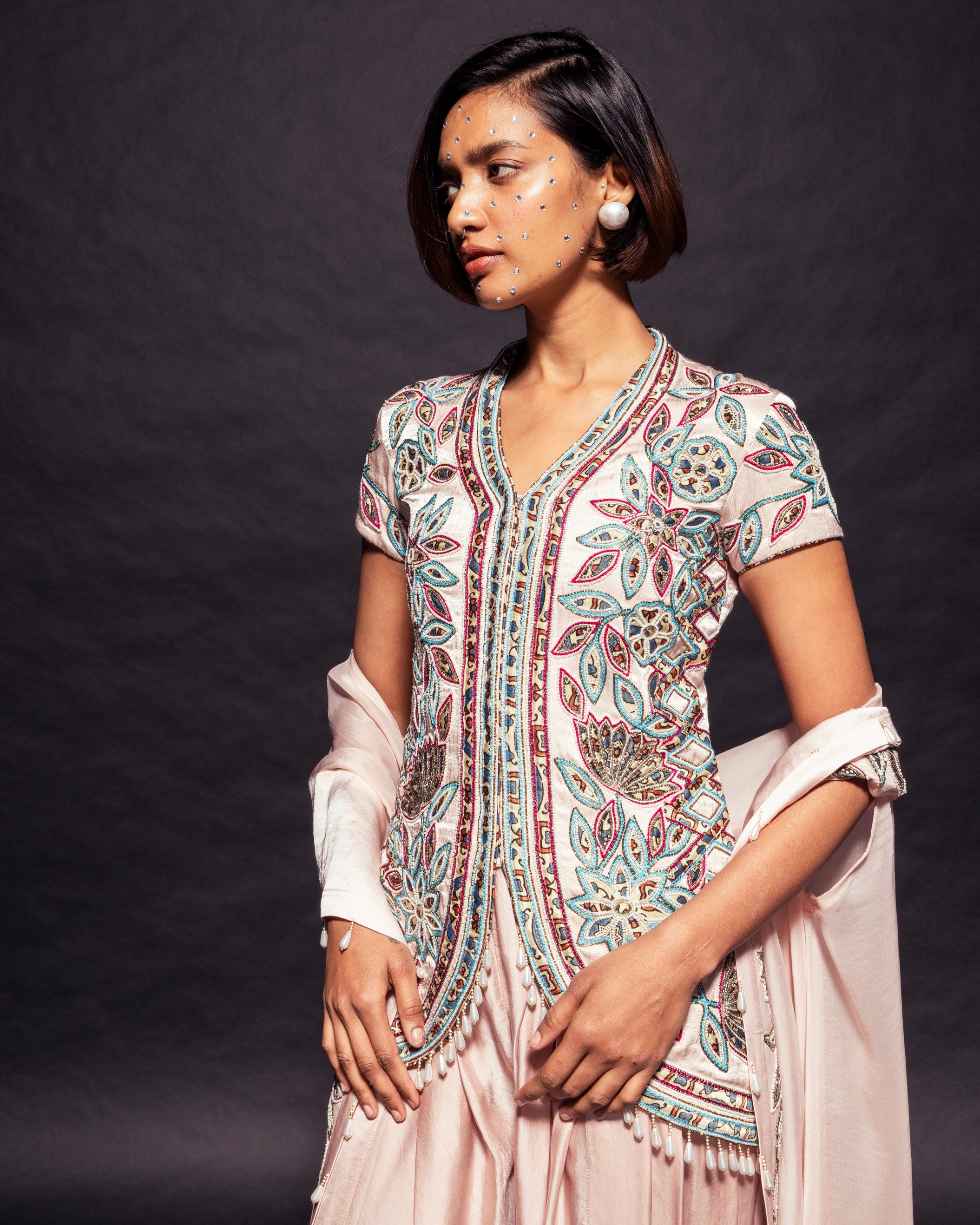Peachy Pink ajrakh embellished jacket with cape dupatta and dhoti