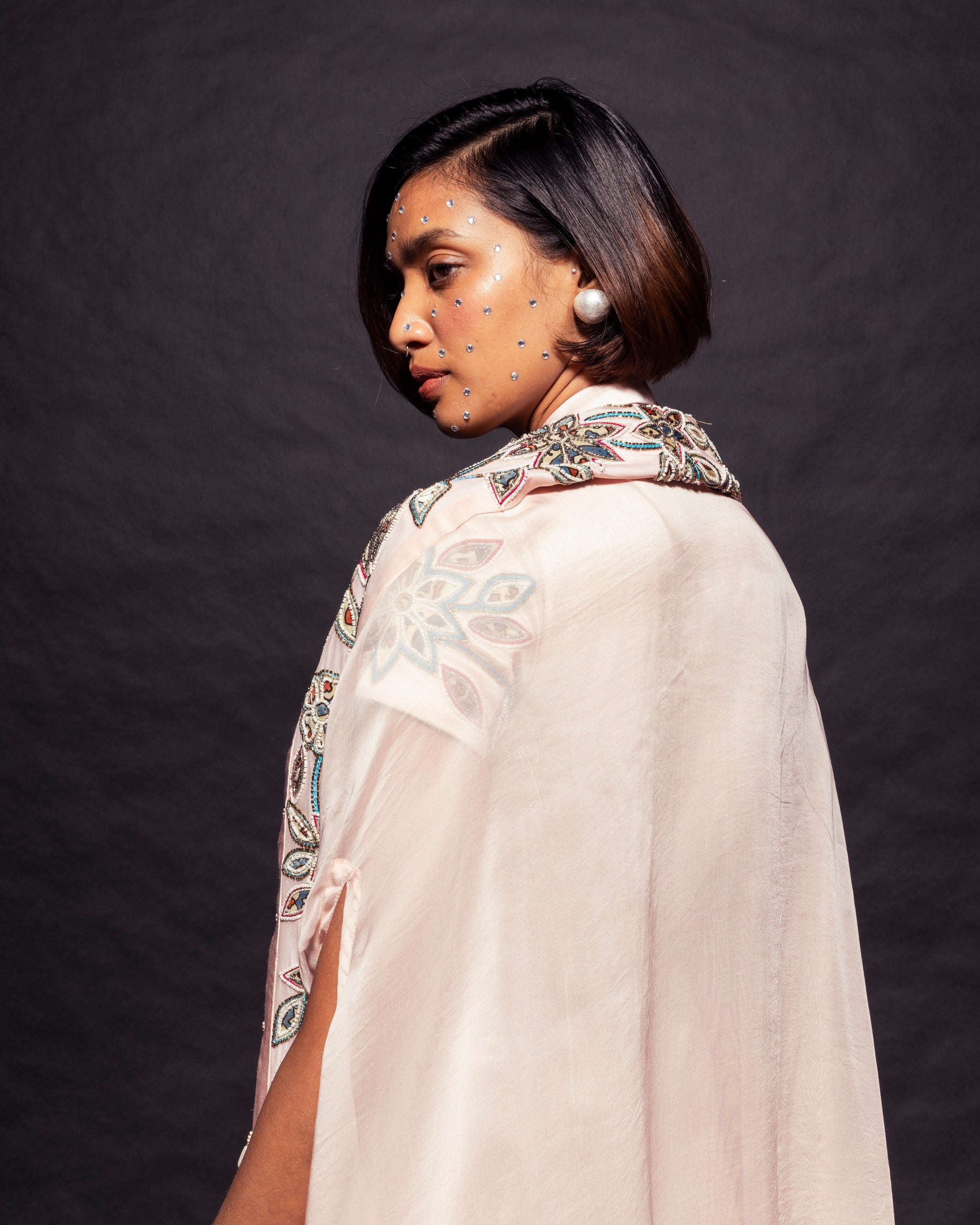 Peachy Pink ajrakh embellished jacket with cape dupatta and dhoti