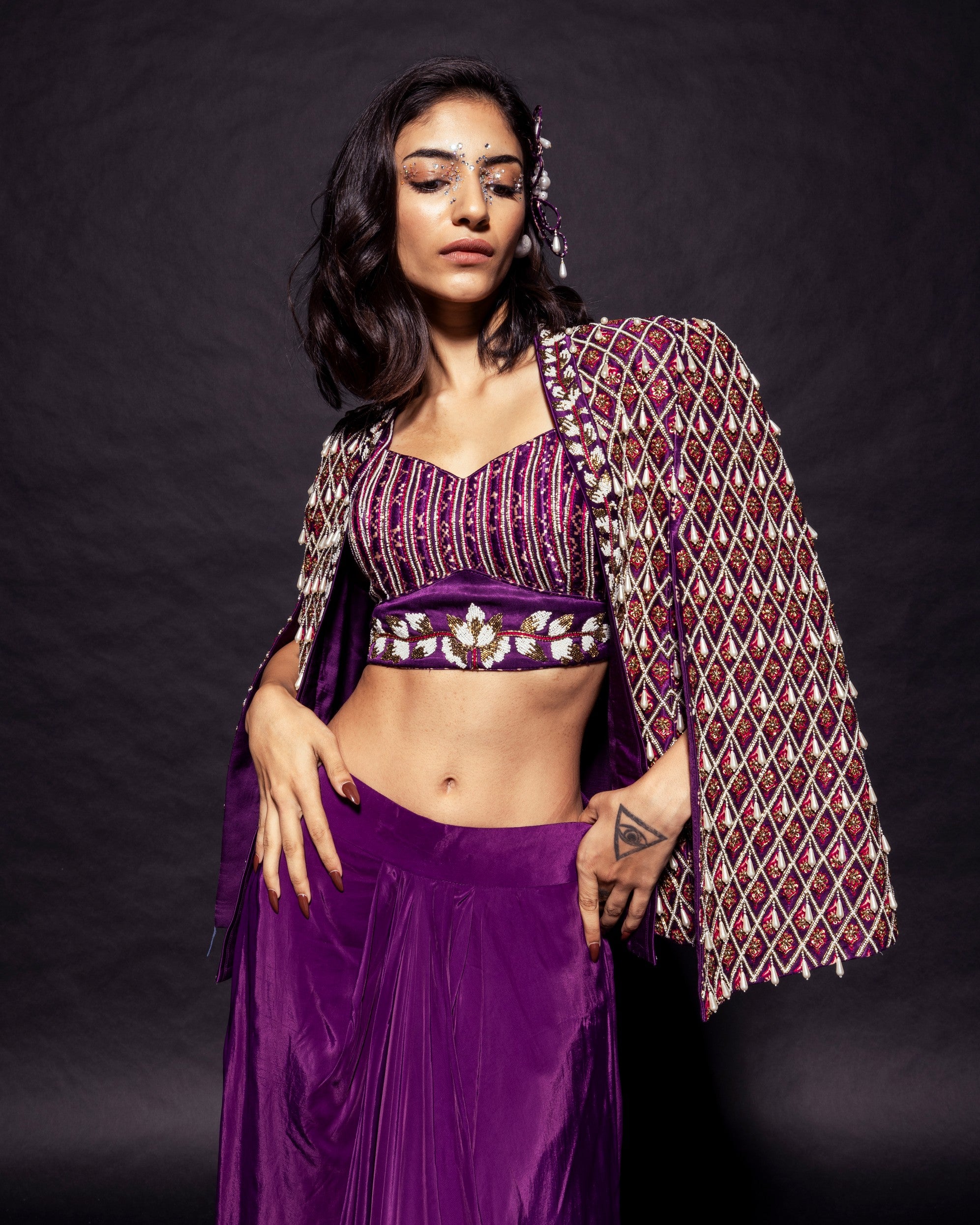Dark purple Fully embroidered ajrakh cape jacket with heavily embellished blouse and drape skirt