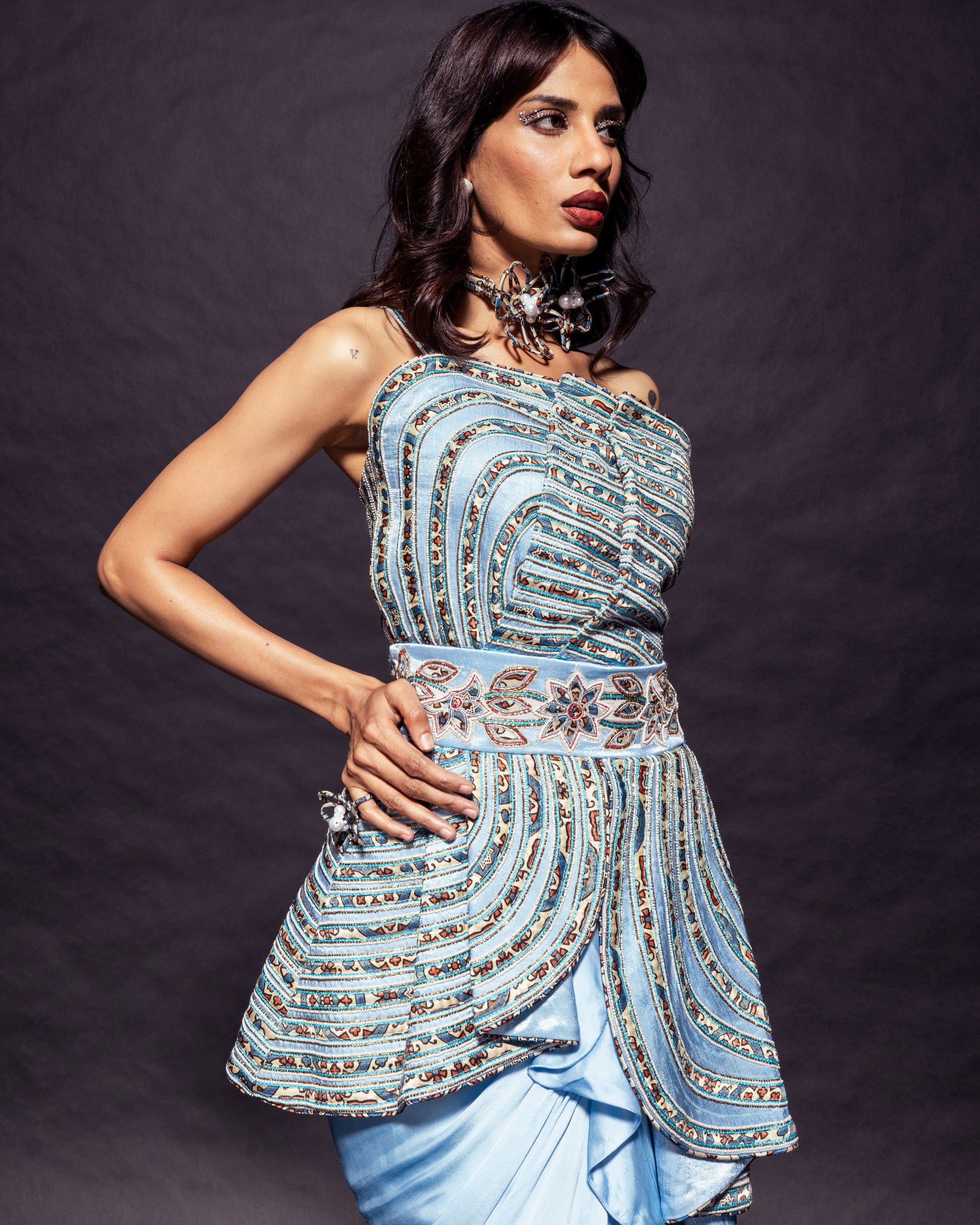 Powder blue ajrakh embroidered assymetric peplum top with Drape dhoti skirt