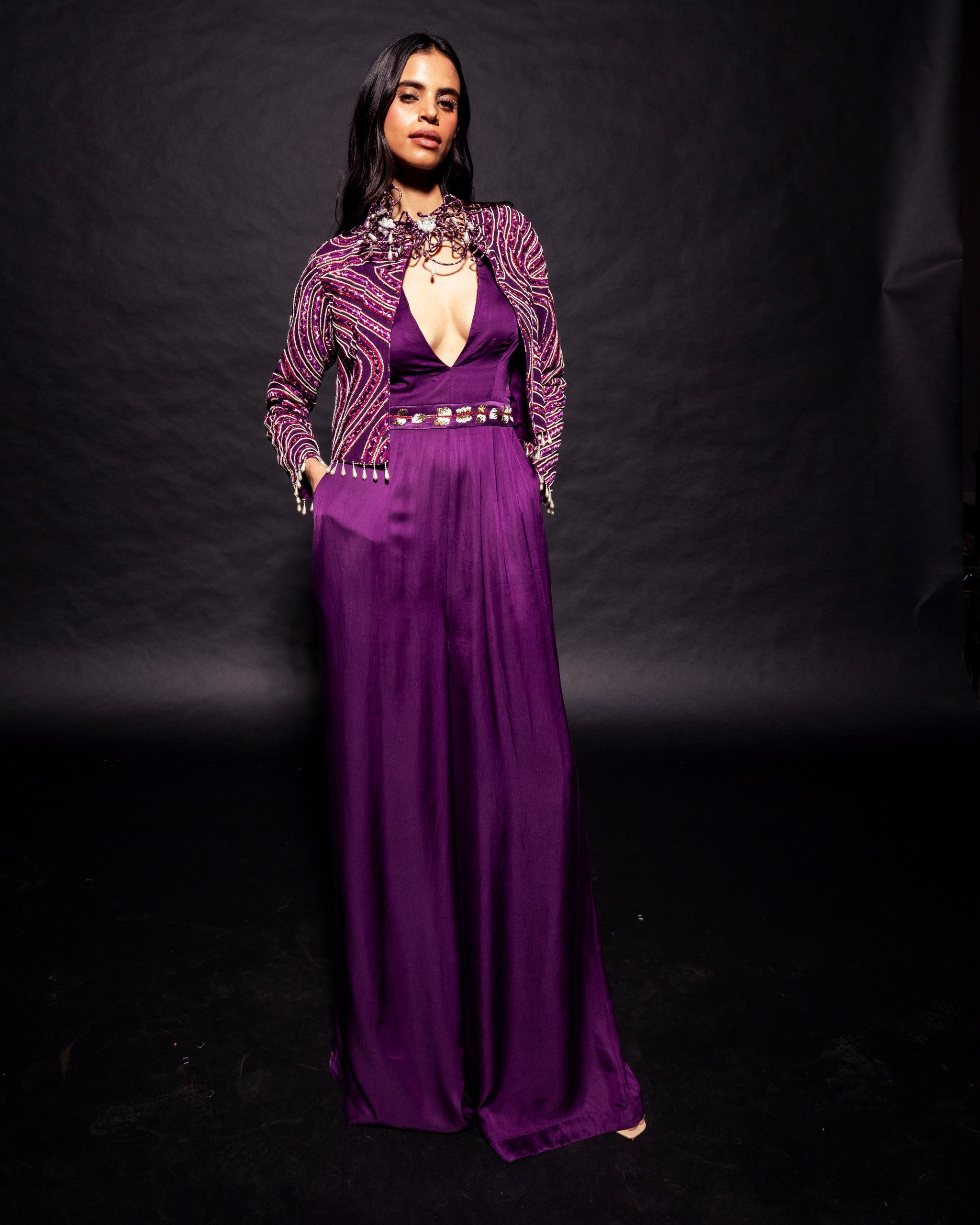 Dark purple deep V neck jumpsuit with Ajrakh ebellsihed jacket