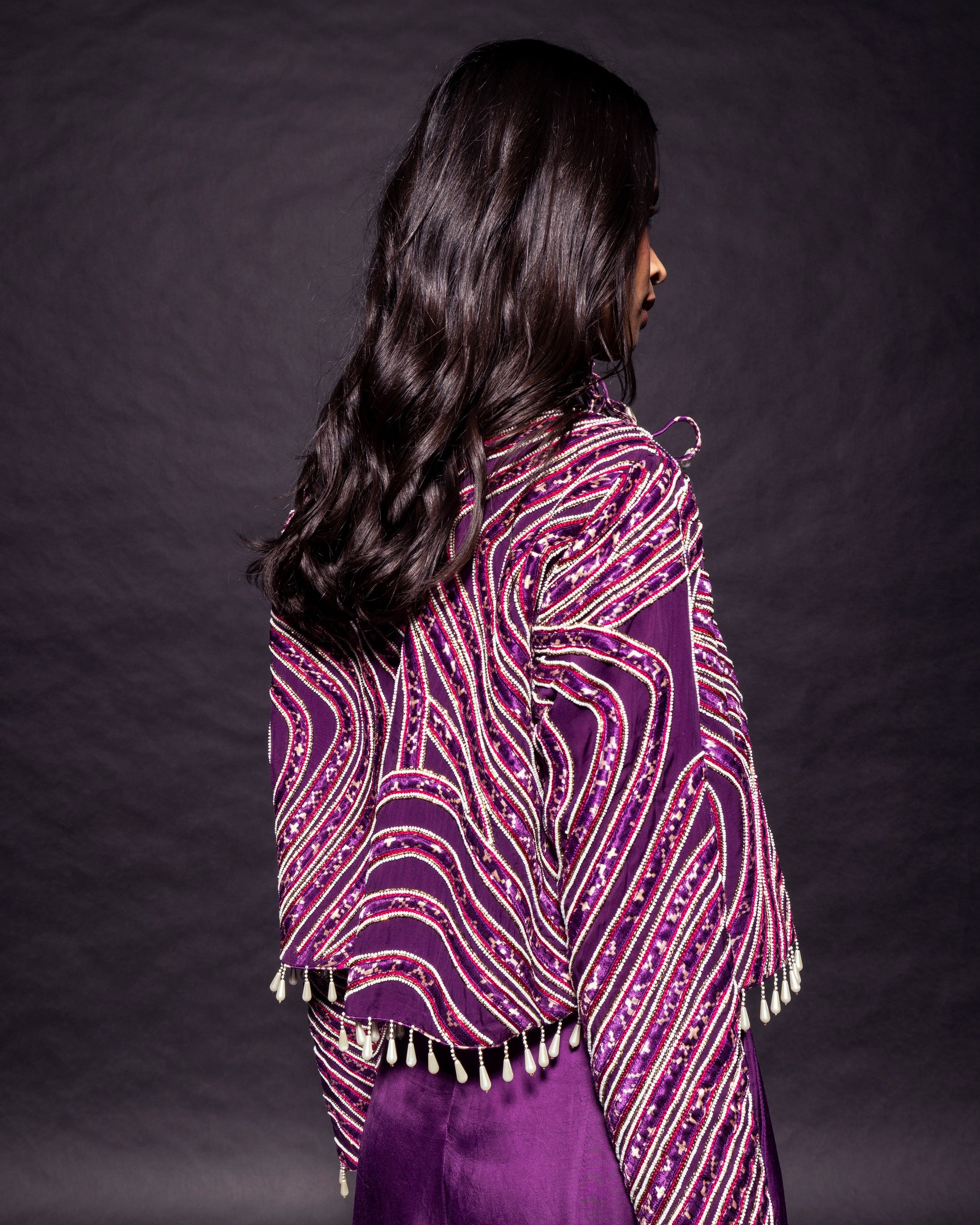 Dark purple deep V neck jumpsuit with Ajrakh ebellsihed jacket