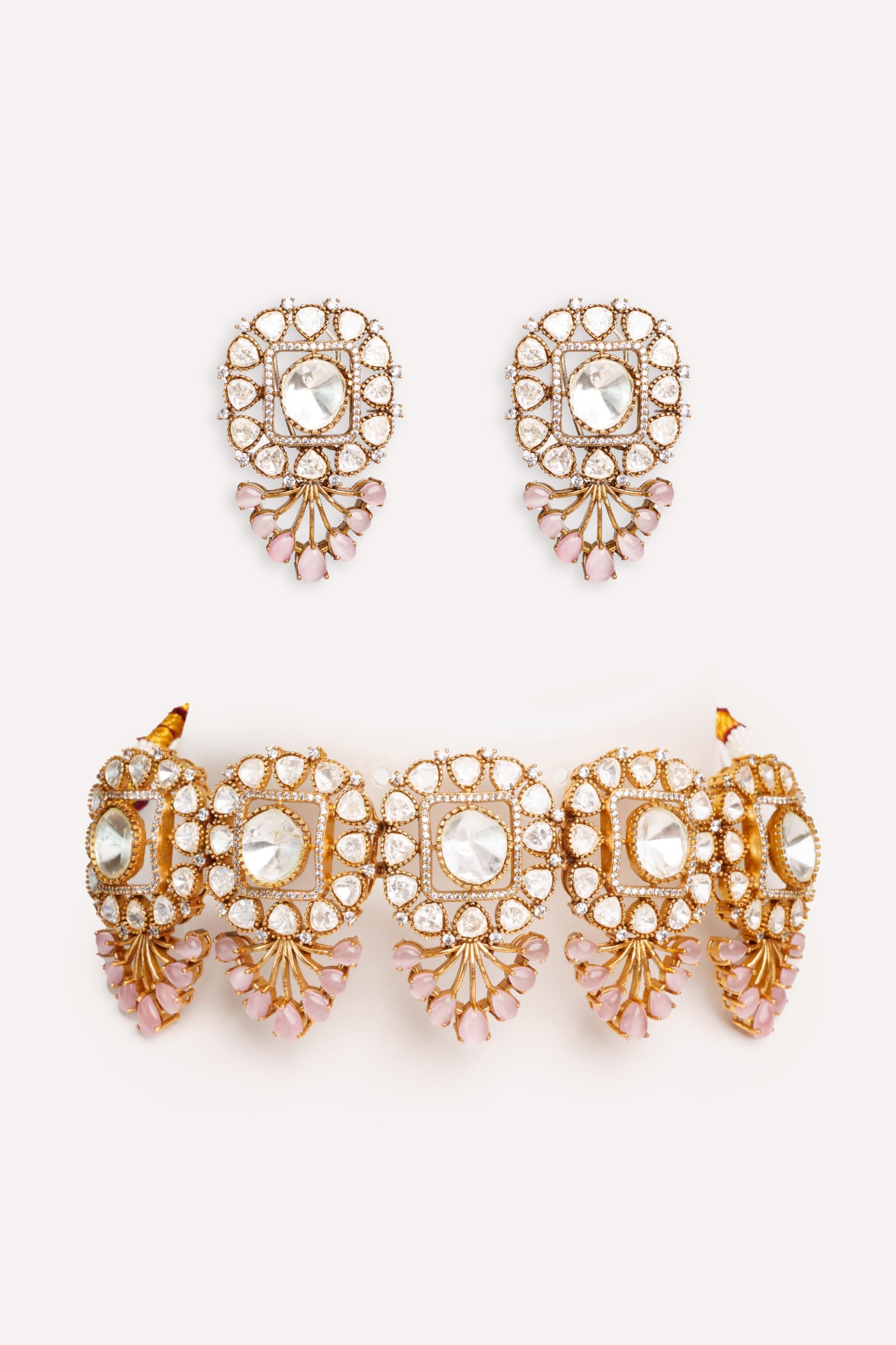 Bold and dramatic two tone finish polki choker set