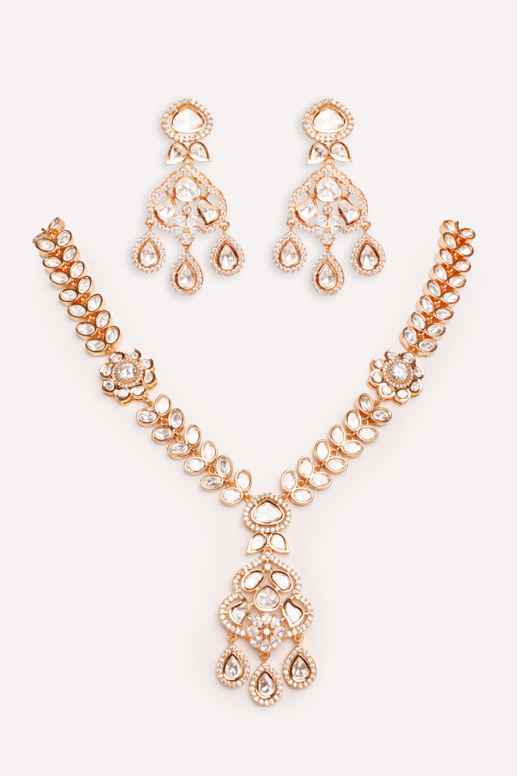 Bold and dramatic kundan long pendant necklace with elegant earrings