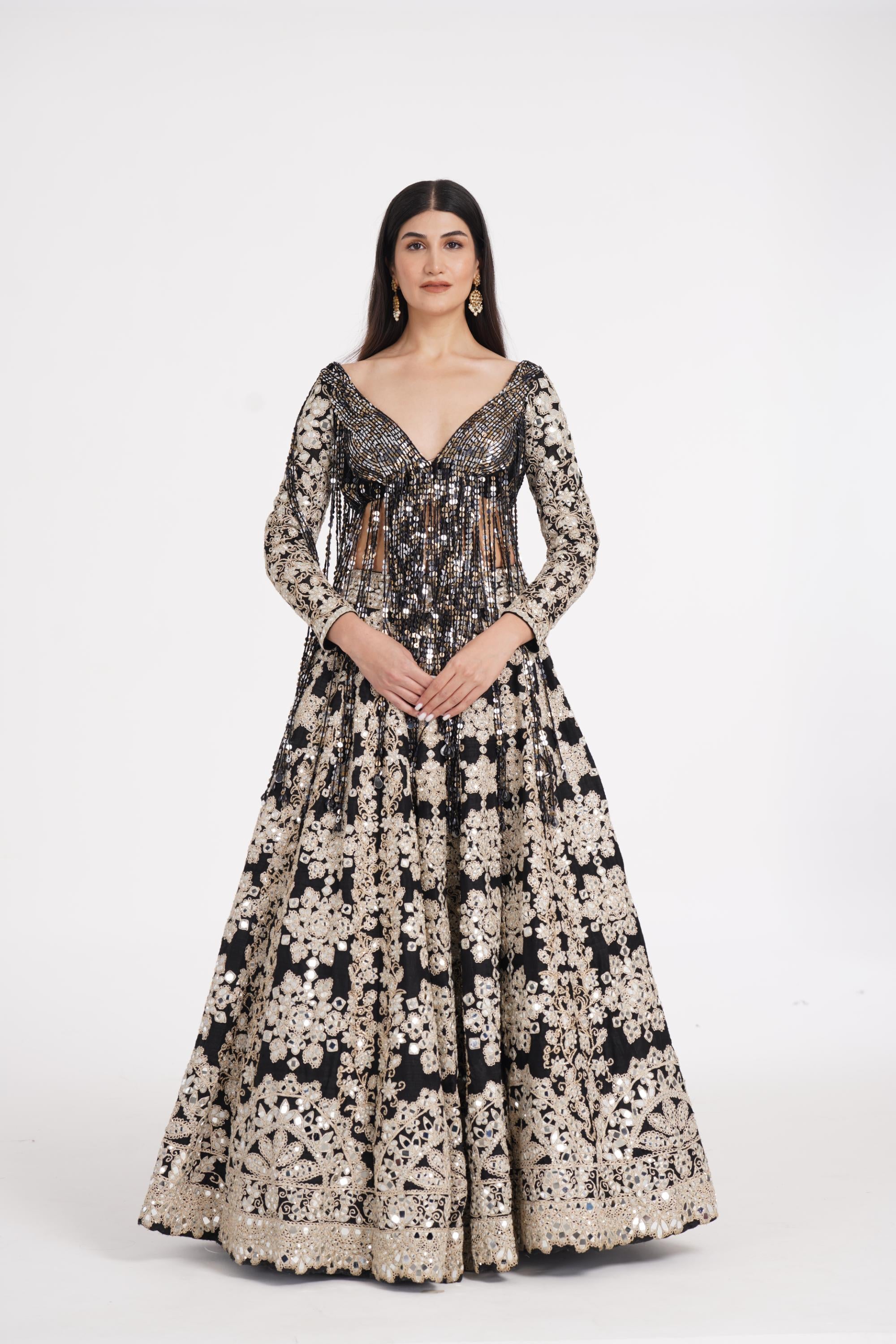 Jet black lehenga set embellished using ivory details