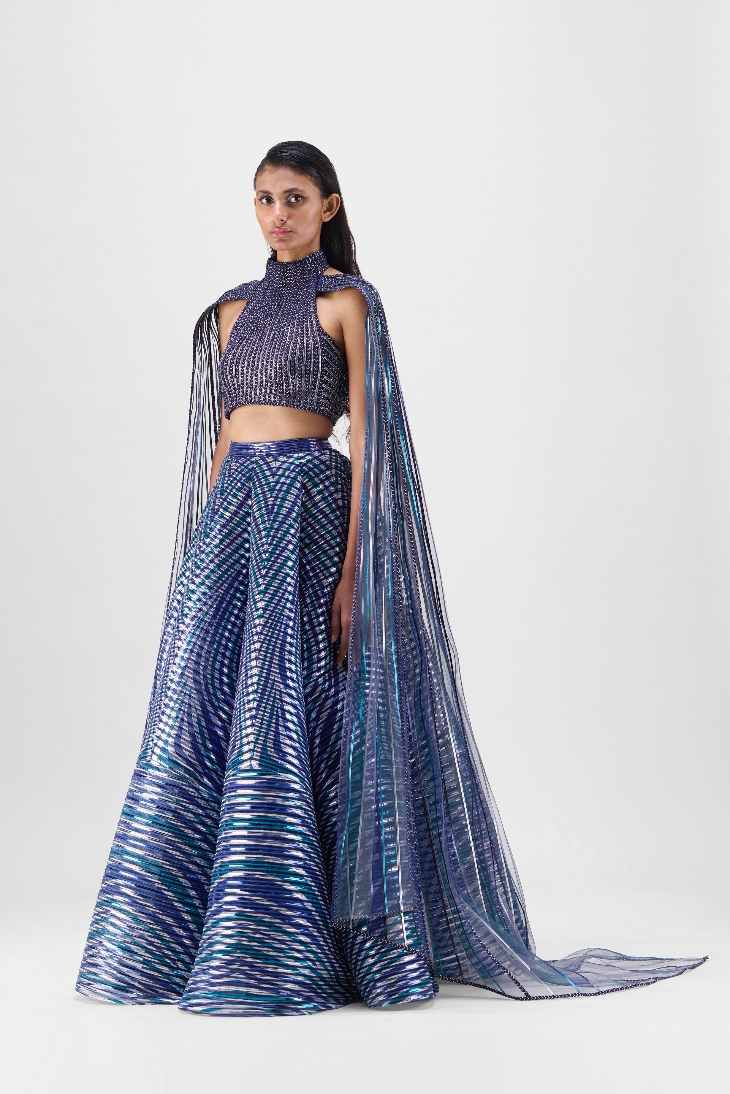 METALLIC BRAIDED HALTER TOP WITH A FLUTED TULLE PRINTED SKIRT