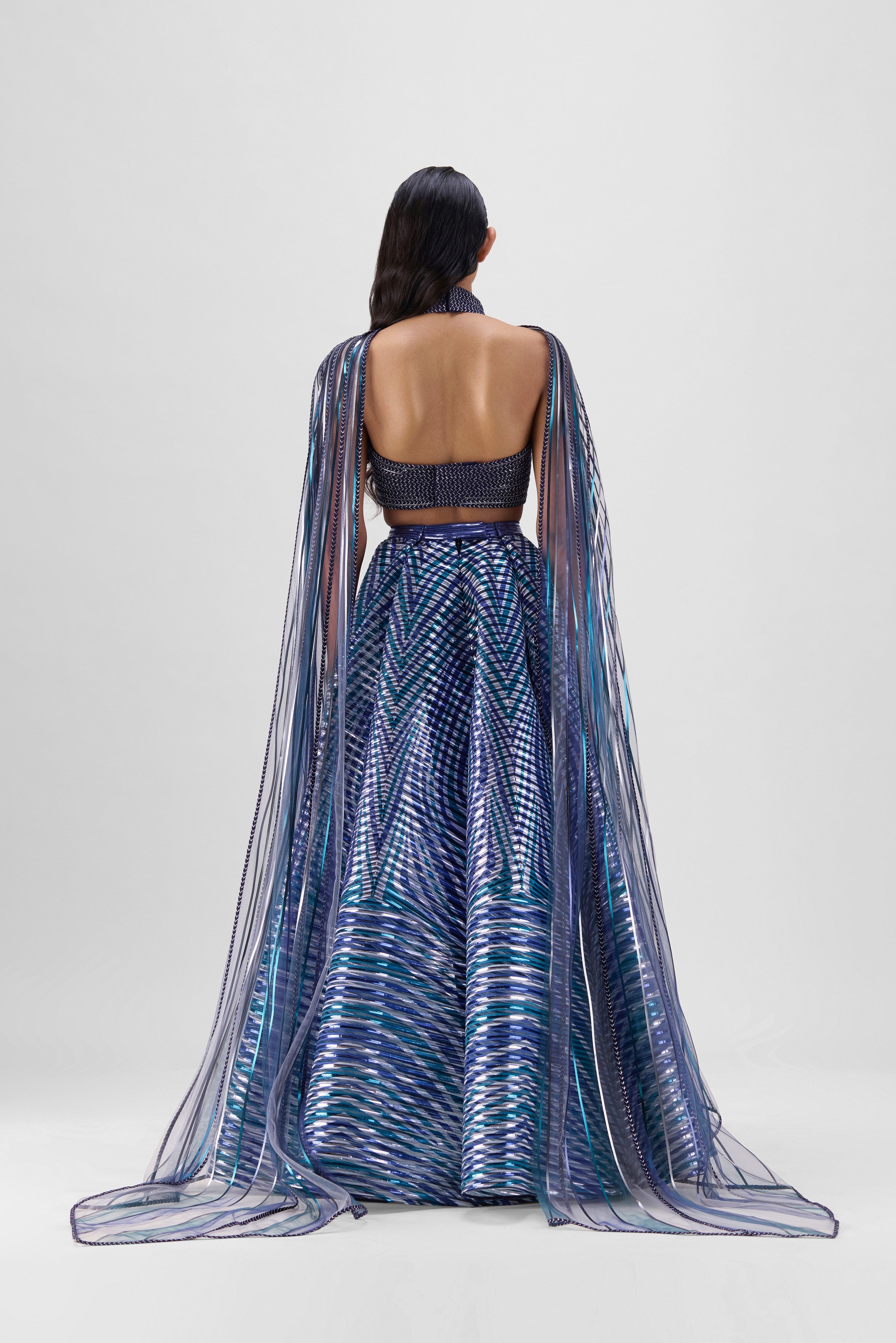 METALLIC BRAIDED HALTER TOP WITH A FLUTED TULLE PRINTED SKIRT