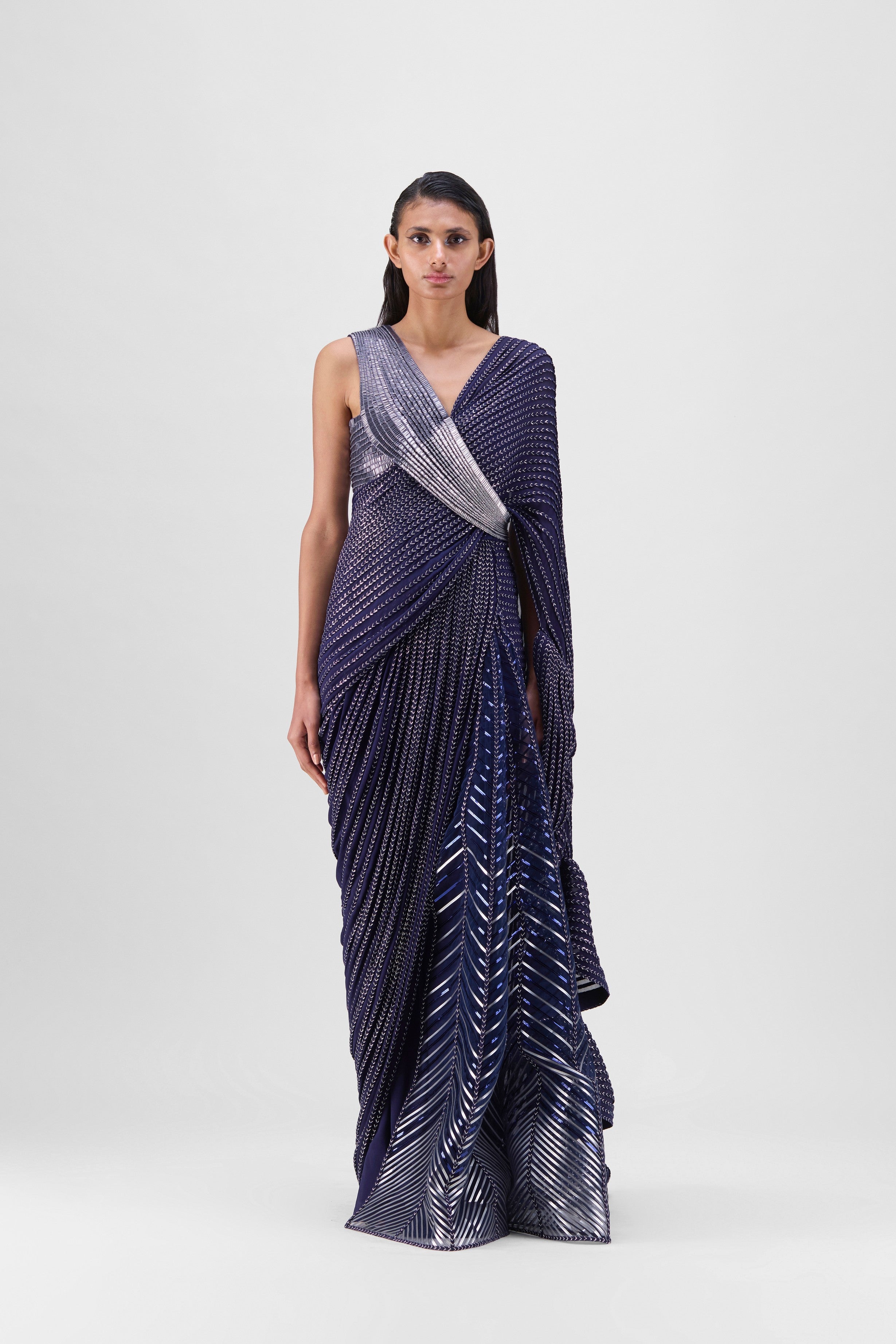 METALLIC STRUCTURED GOWN WITH RUFFLE BRAIDED DRAPE