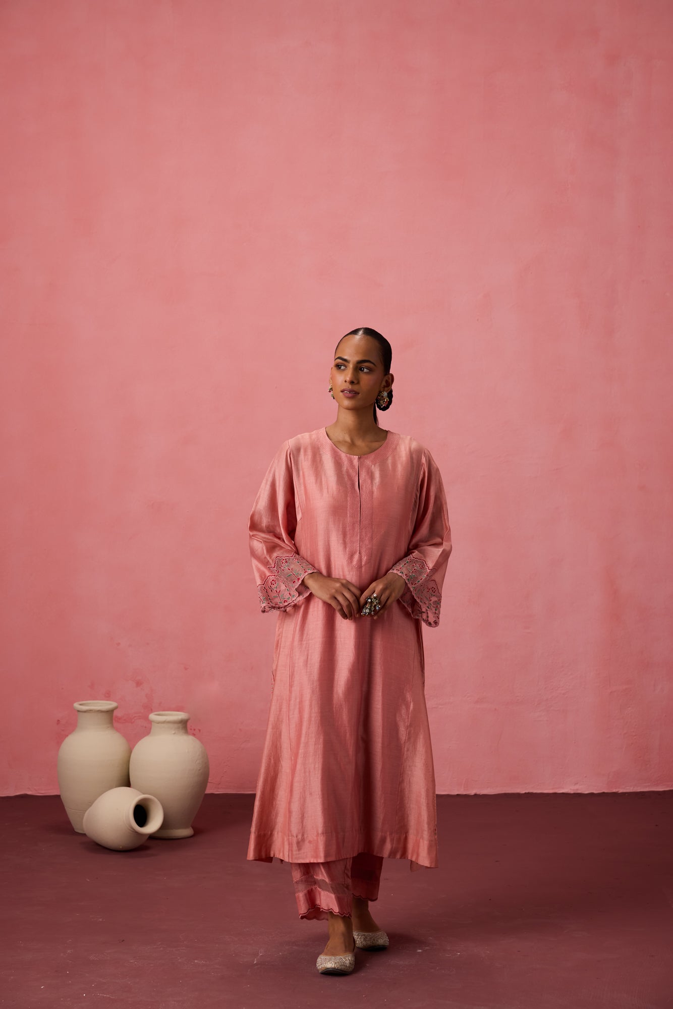 Peach chanderi embroidered kurta with embellished border on sleeves paired with an organic cotton slip pant & organza dupatta