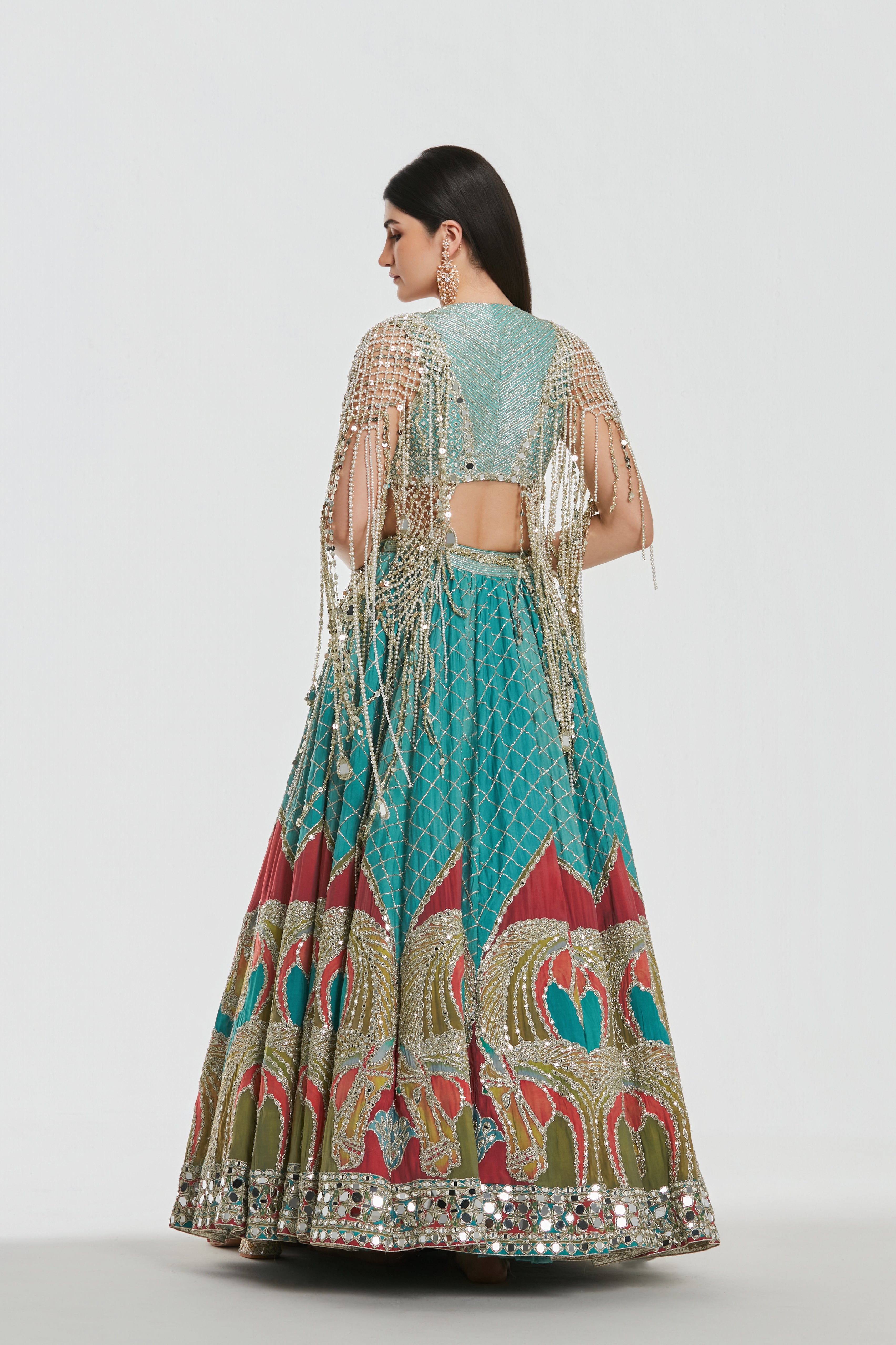 Mirror work , zari , sequins , pearl beads