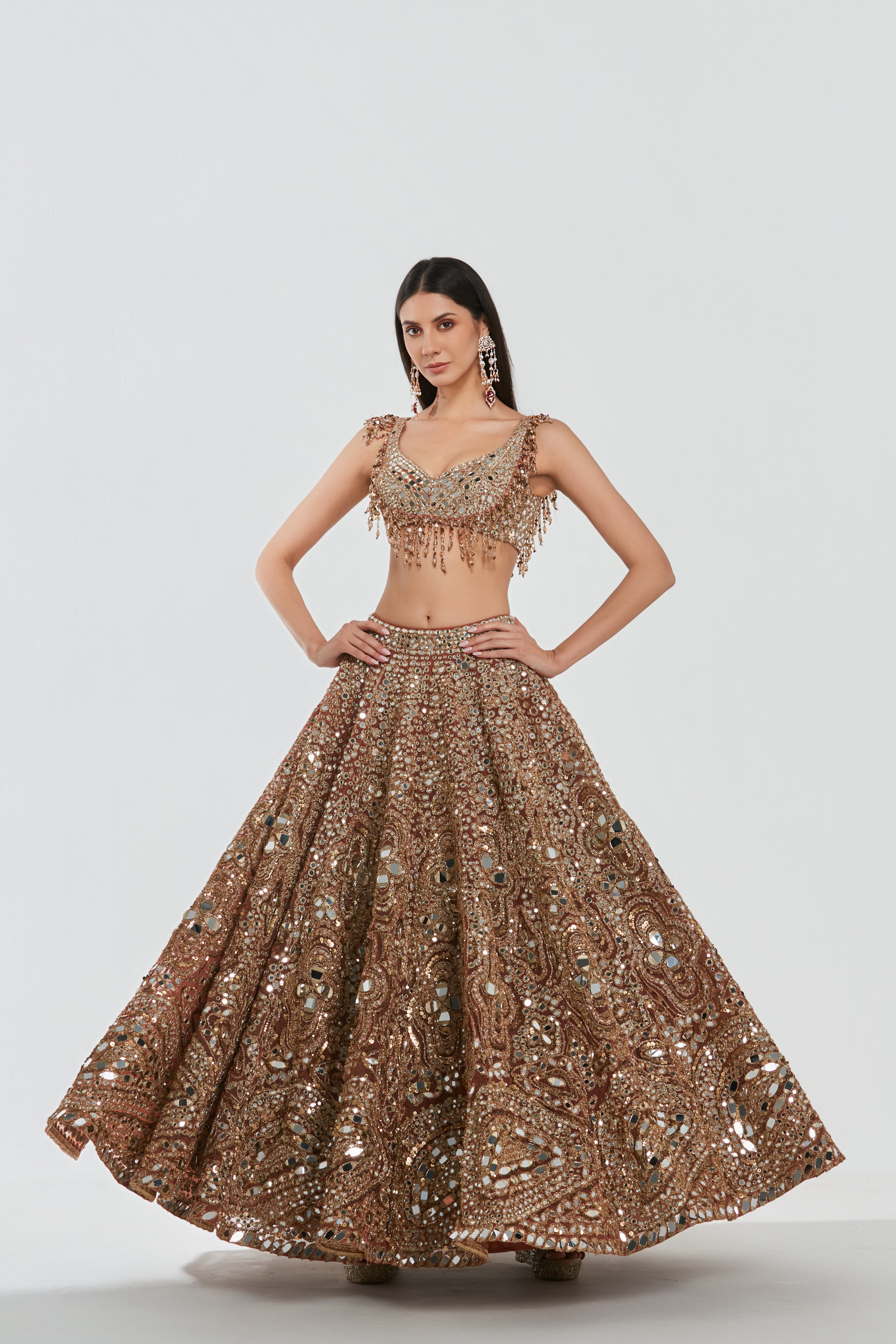 Mirror work , zari , lurex thread, glass beads