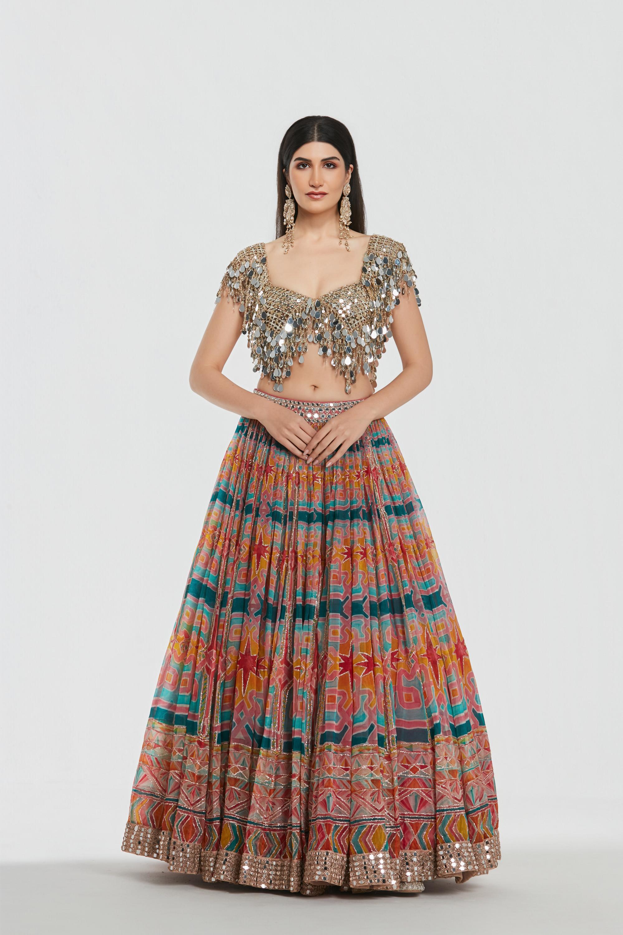 Mirror work , zari , dori thread , sequins