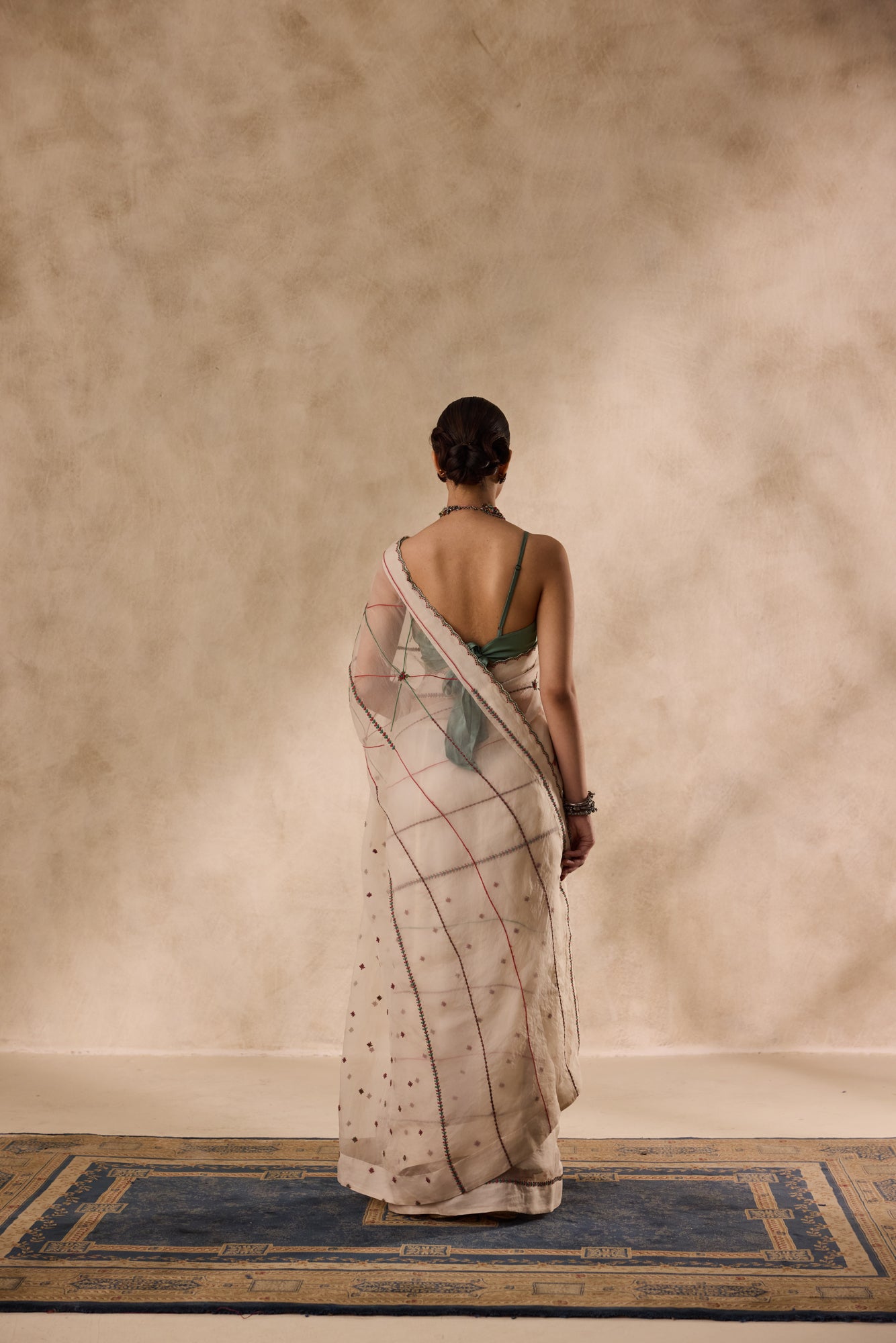 Ivory organza resham and thread embroidered saree comes with unstitched & unembroidered blouse fabric in chanderi