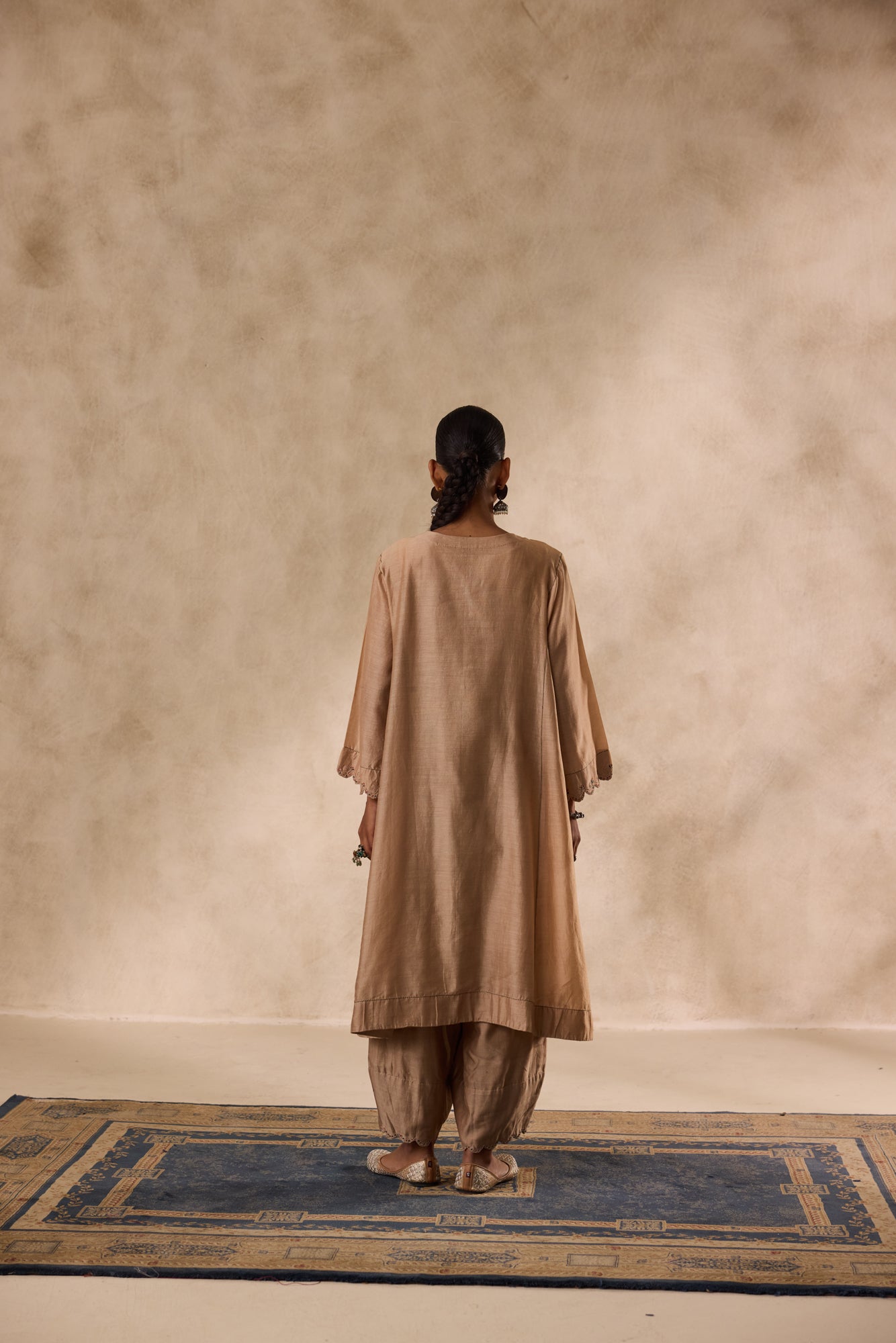Champagne chanderi dori work embroidered kurta paired with organic cotton slip, afgani salwar & organza dupatta