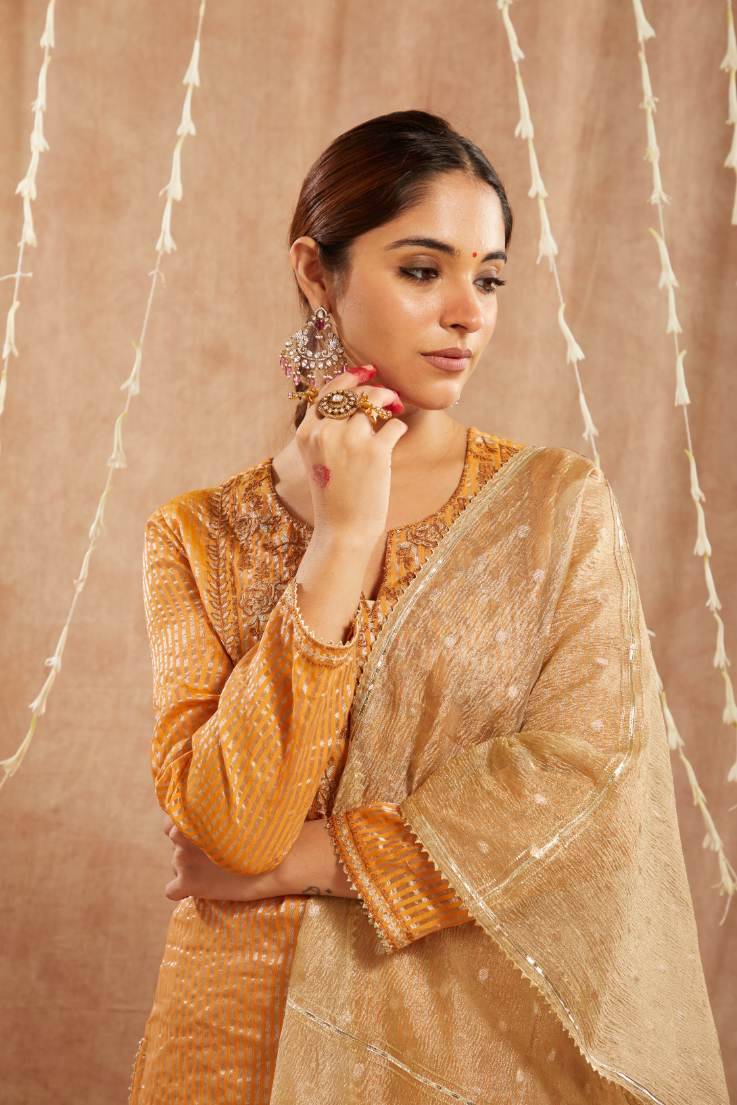 Orange Glory Embroidered Kurta with
Narrow Pants