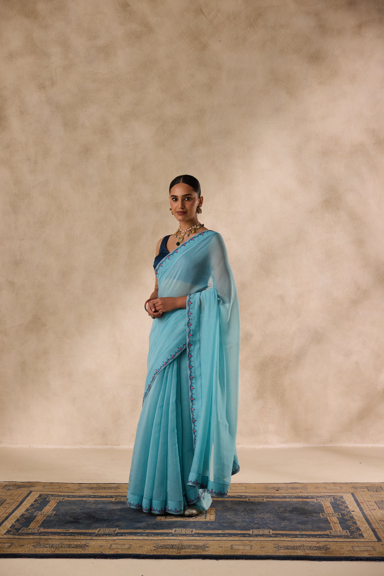Sky blue chanderi scalloped embroidered saree comes with unstitched & unembroidered blouse fabric in chanderi