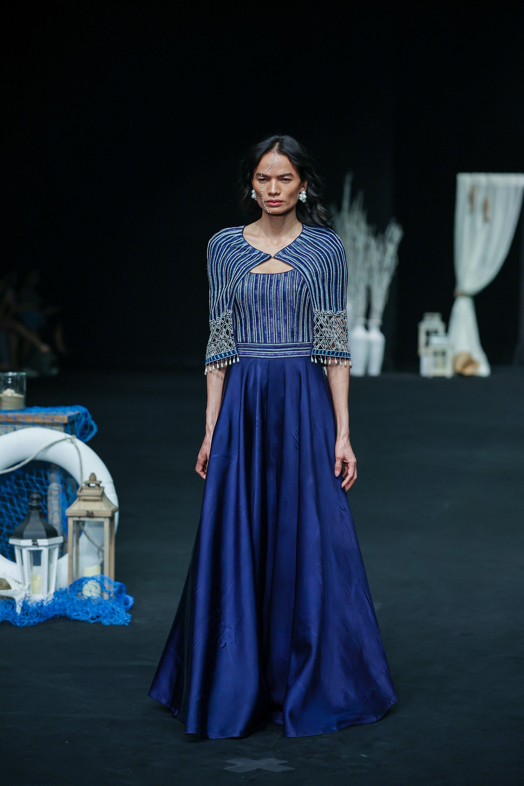 Deep blue ajrakh embellished jumpsuit with fully embsllished ajrakh stripwork cape jacket