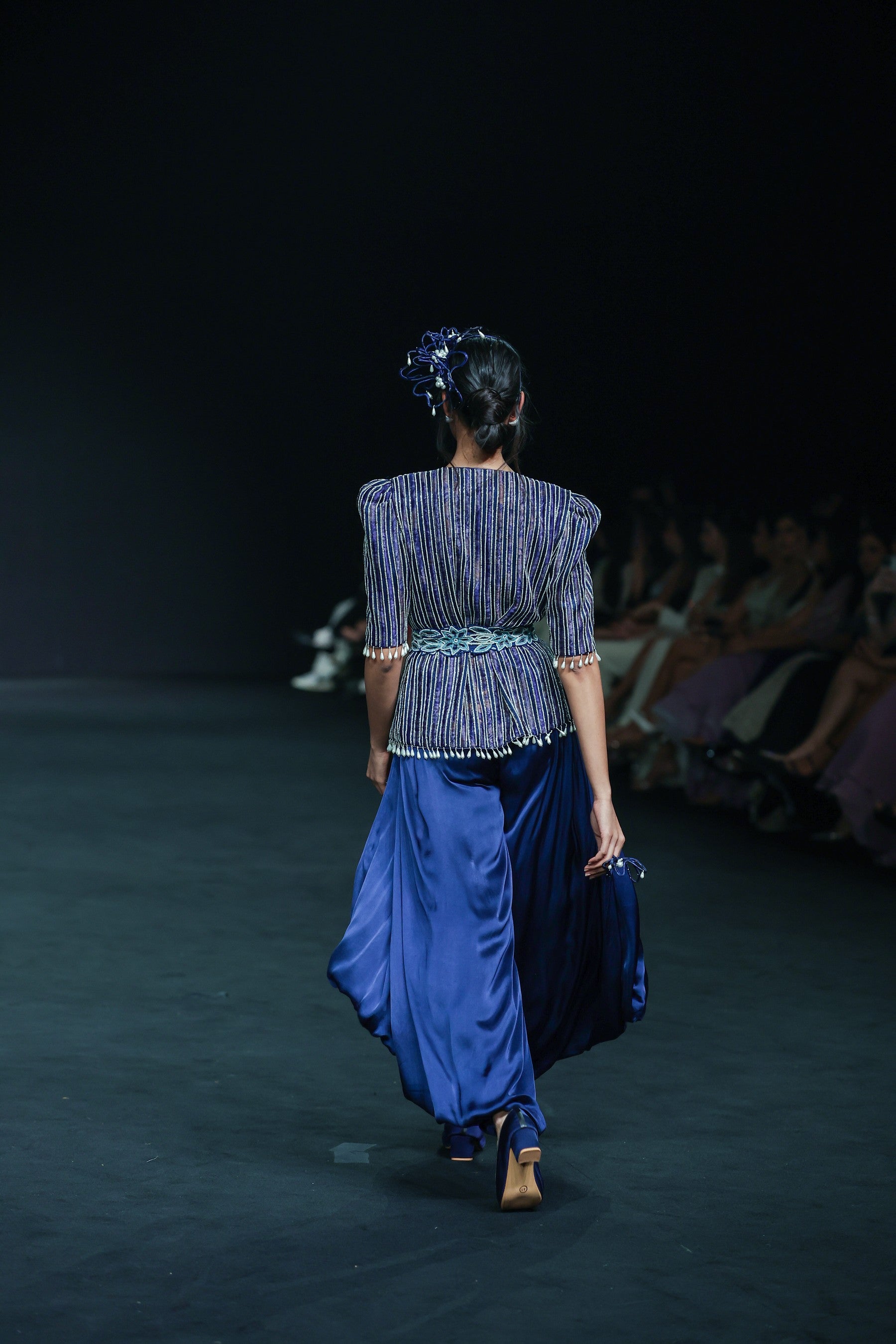 Deep blue side cowl jumpsuit with Ajrakh embellished jacket with patchwork waistbelt