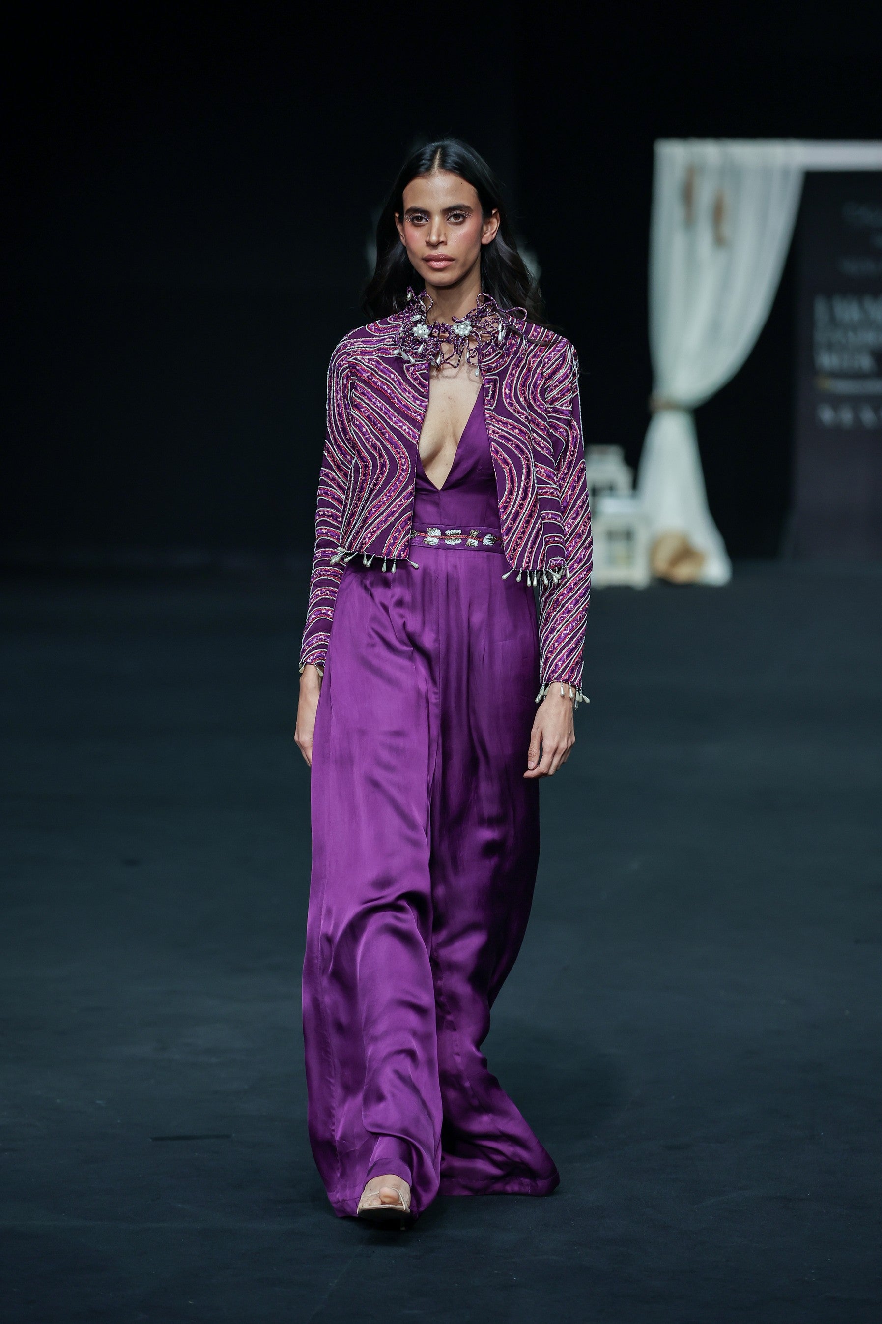 Dark purple deep V neck jumpsuit with Ajrakh ebellsihed jacket