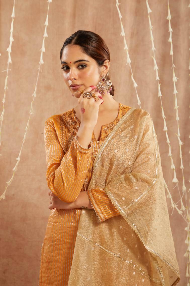 Orange Glory Embroidered Kurta with
Narrow Pants