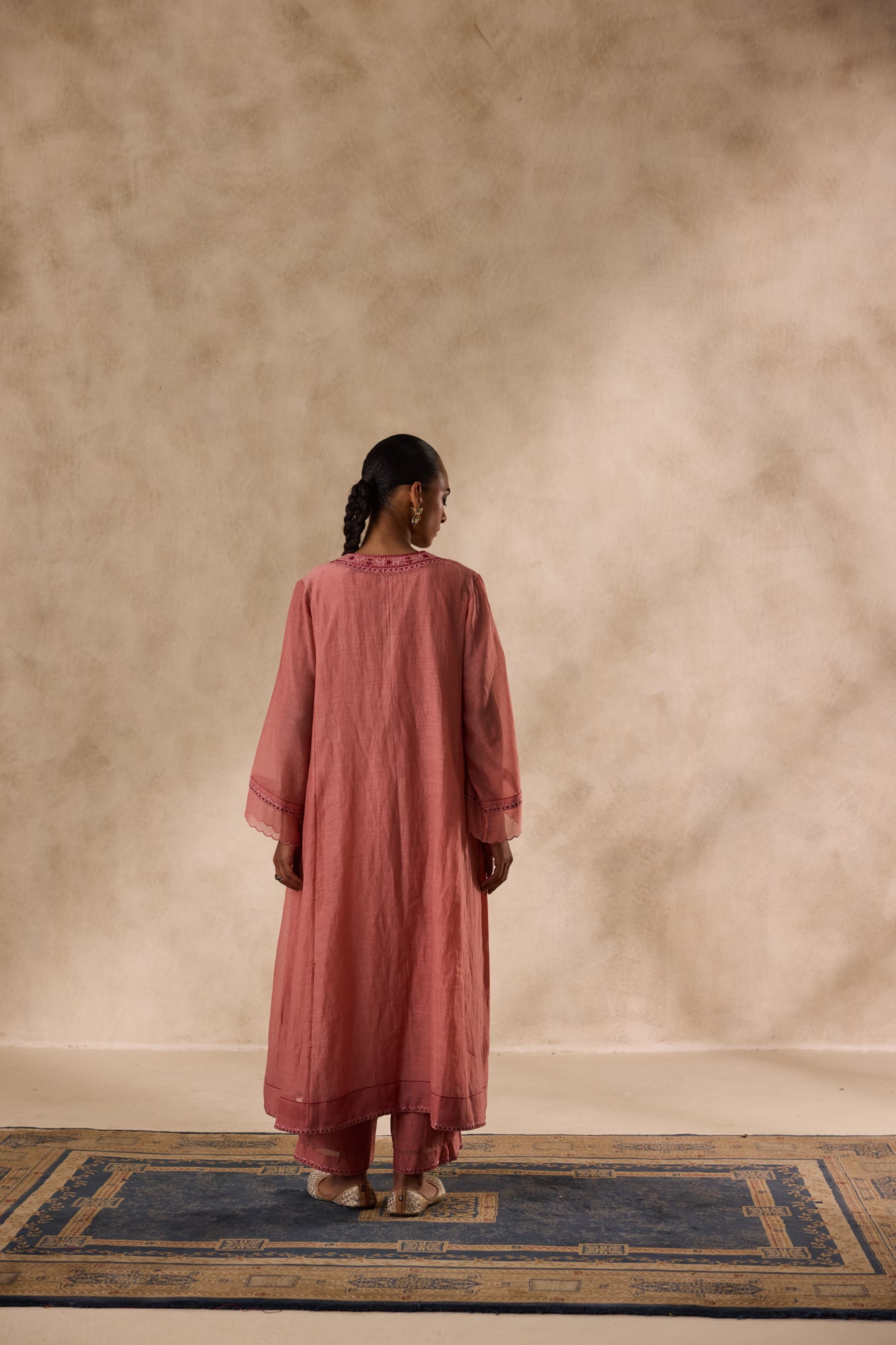 Peach chanderi heavy neckline resham embroidred kurta paired with organic cotton slip,pant & heavy border dupatta