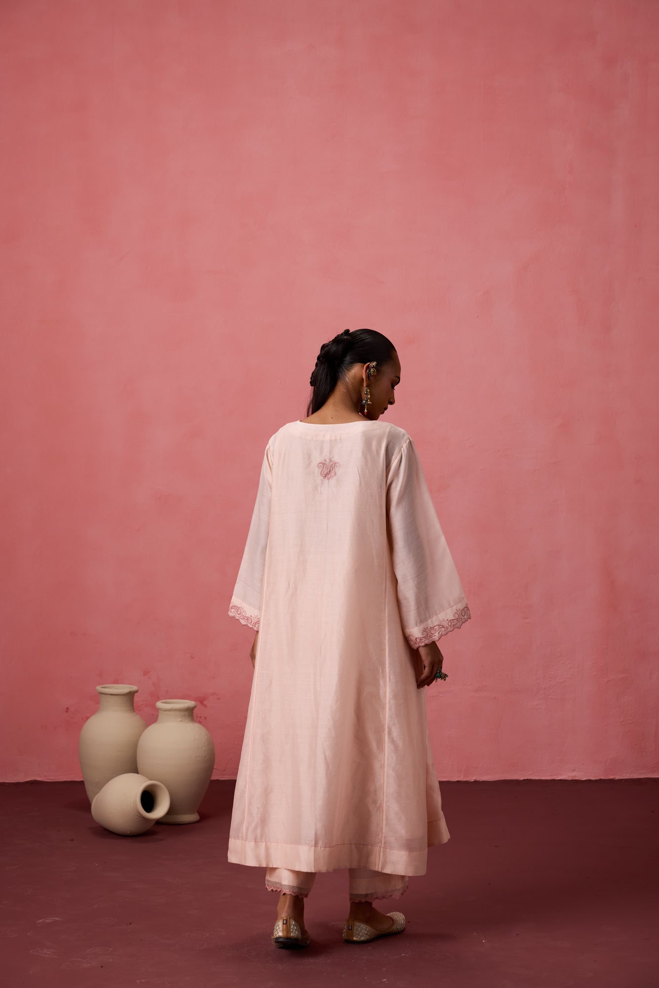 Cozy peach chanderi floral resham embroidered kurta paired with organic cotton slip, pant & organza dupatta