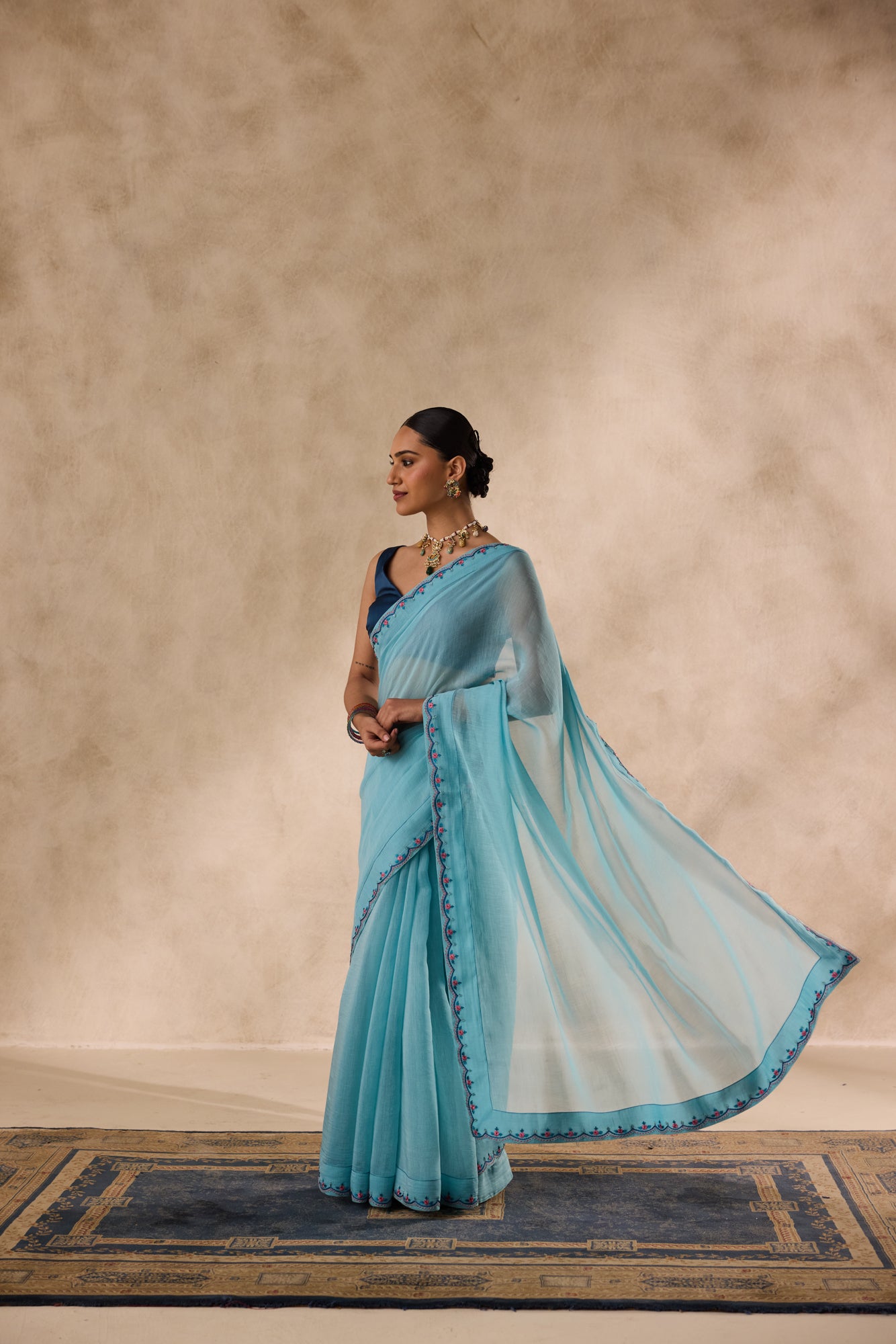 Sky blue chanderi scalloped embroidered saree comes with unstitched & unembroidered blouse fabric in chanderi