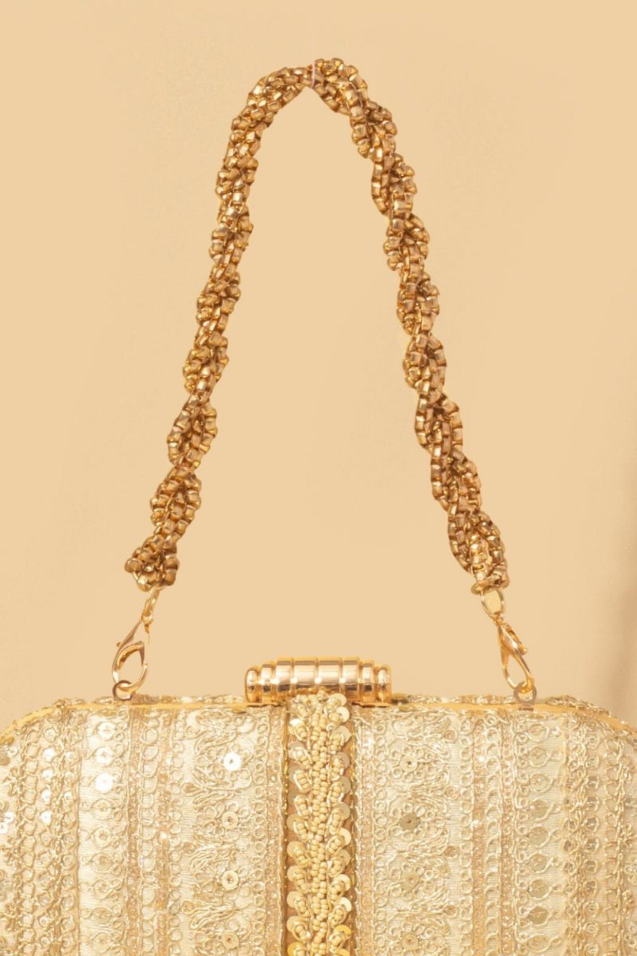 Naaz Embroidered Capsule Clutch - Gold