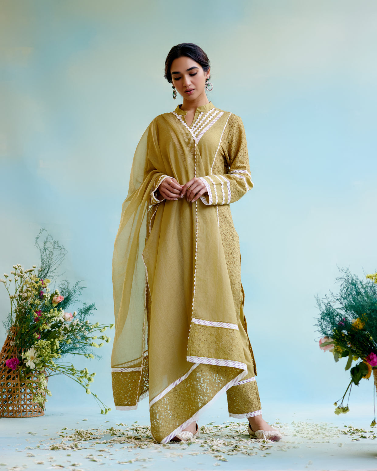 Olive Brown Kurta in Cotton Dobby and Schiffli fabric with Delicate Lace Detaling with Narrow Pants