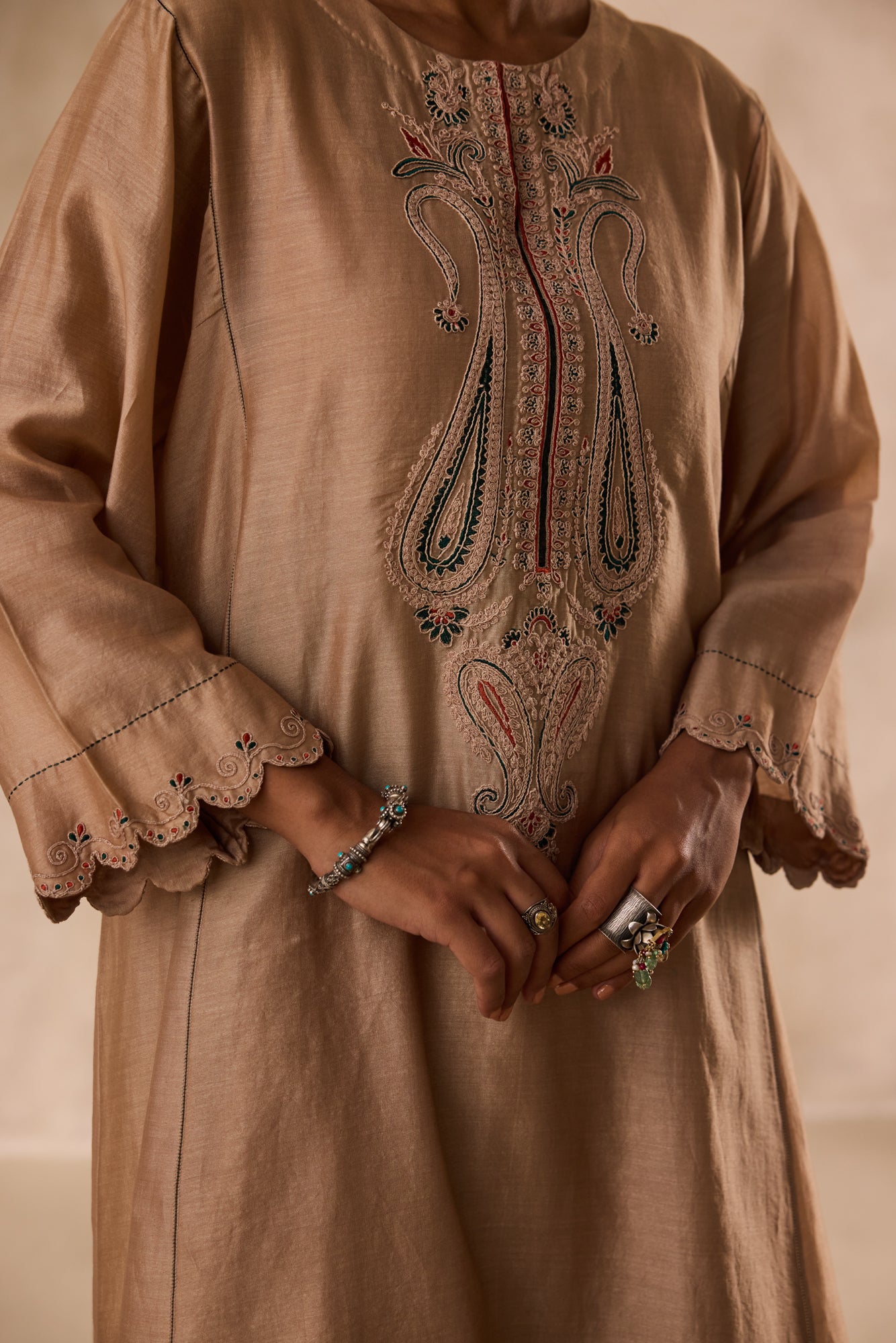 Champagne chanderi dori work embroidered kurta paired with organic cotton slip, afgani salwar & organza dupatta
