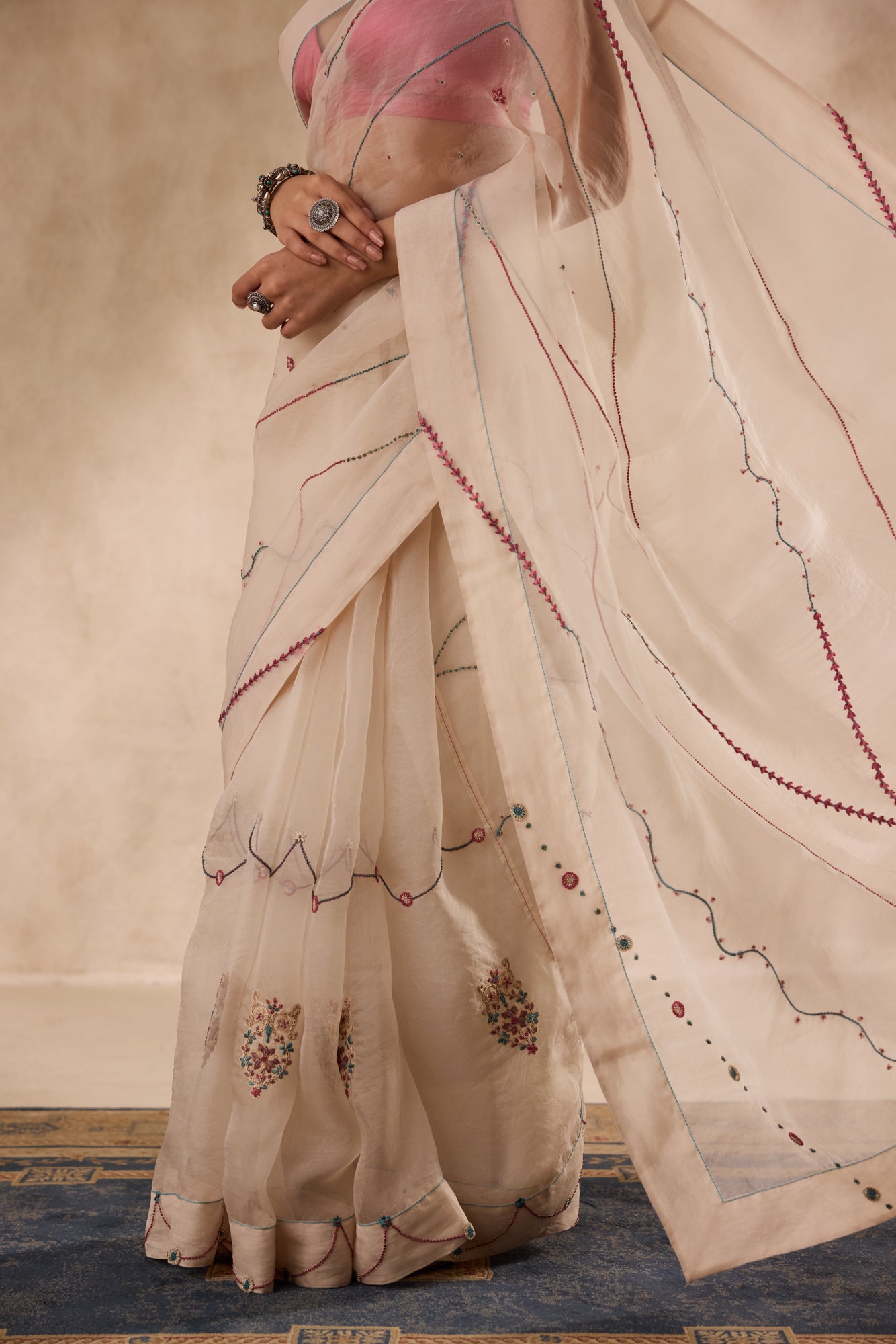 Ivory organza french knot jaal & paisley work saree comes with unstitched & unembroidered blouse fabric in chanderi
