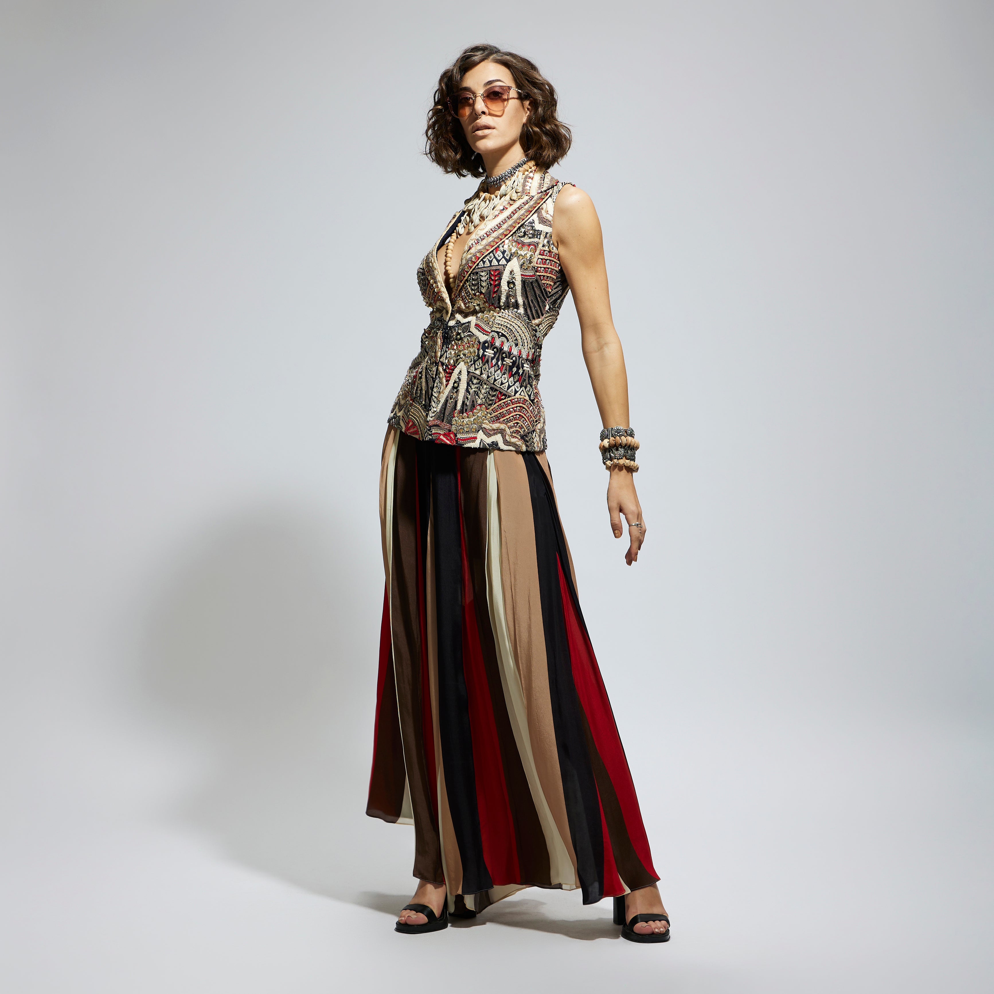 BLUE ABSTRACT EMBELLISHED JACKET PAIRED WITH SAMSARA STRIPE FLARED PANTS