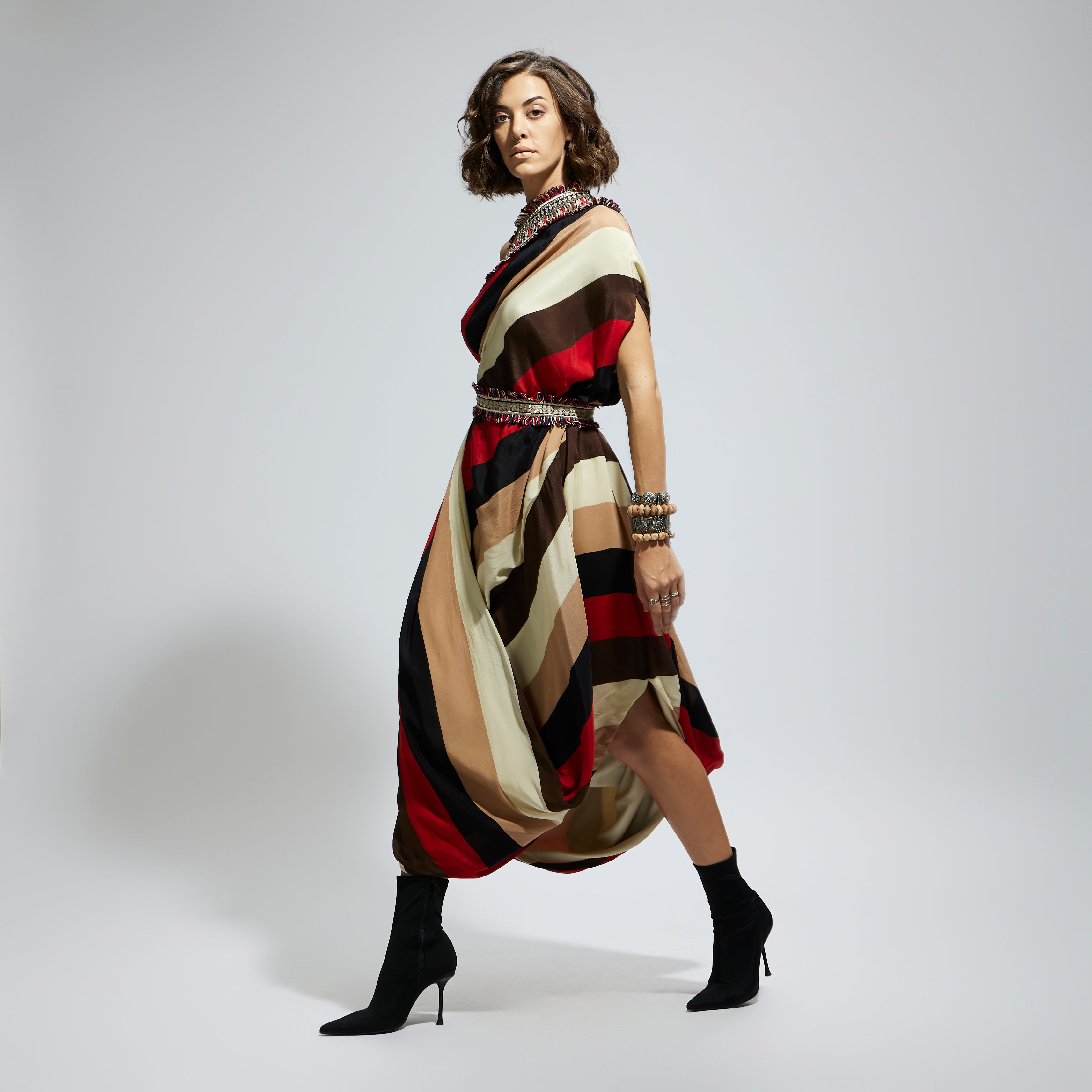 SAMSARA STRIPE ONE SHOULDER COWL DRESS TEAMED WITH A BELT