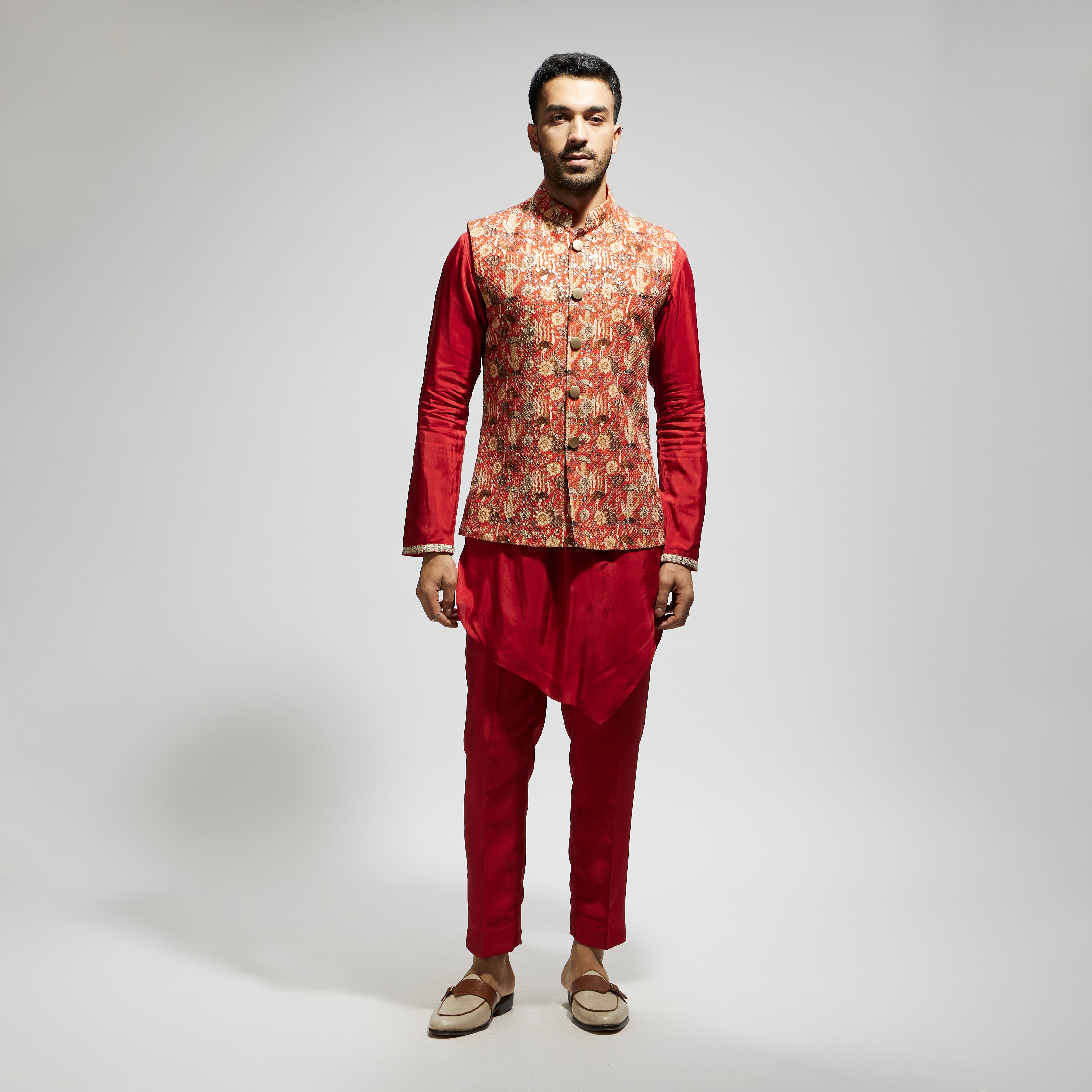 ORANGE JAAL EMBELLISHED BUNDI PAIRED WITH ORANGE DRAPE KURTA AND PANTS