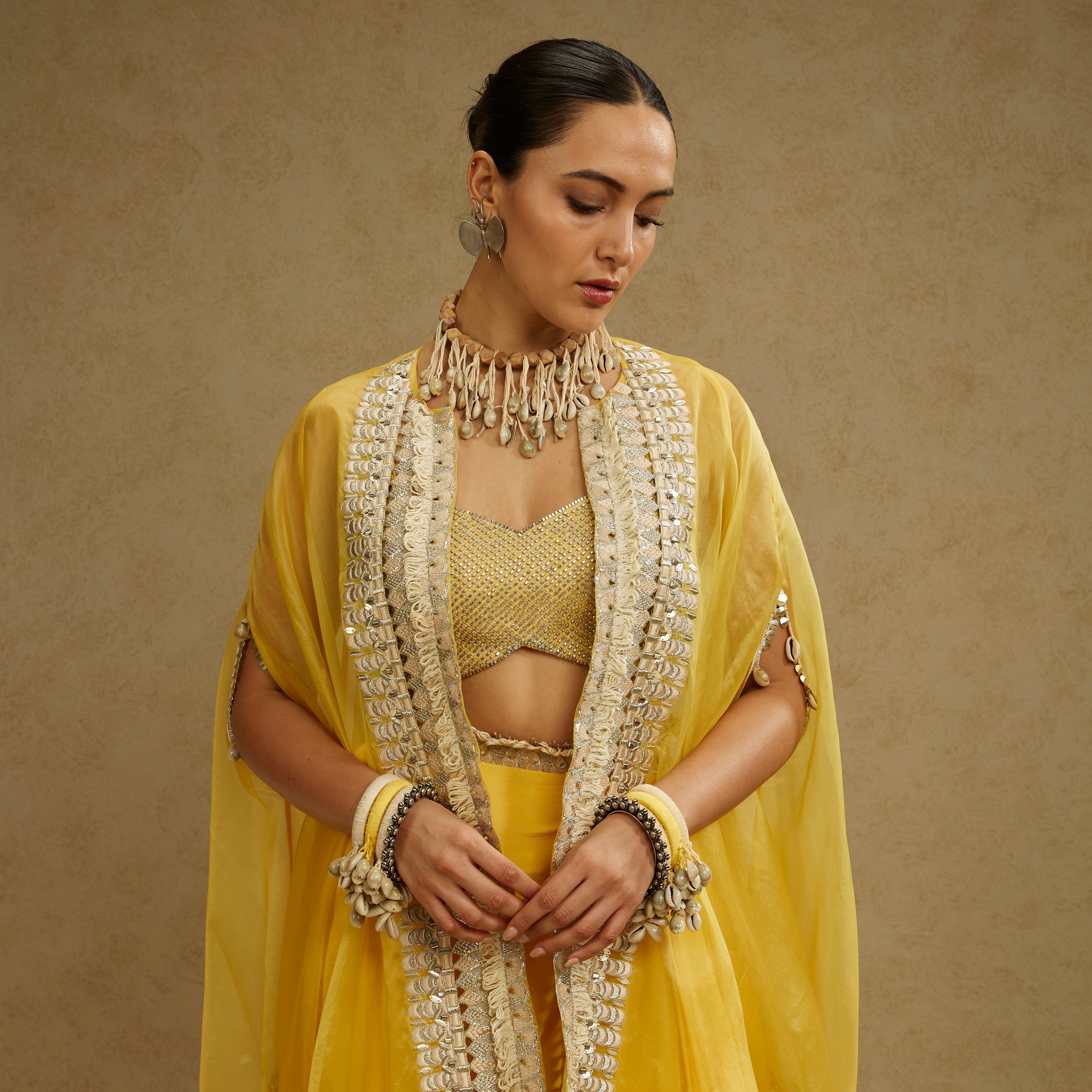 Metal Embellished Bustier with Organza Cape and Dandelion Yellow Drape Skirt