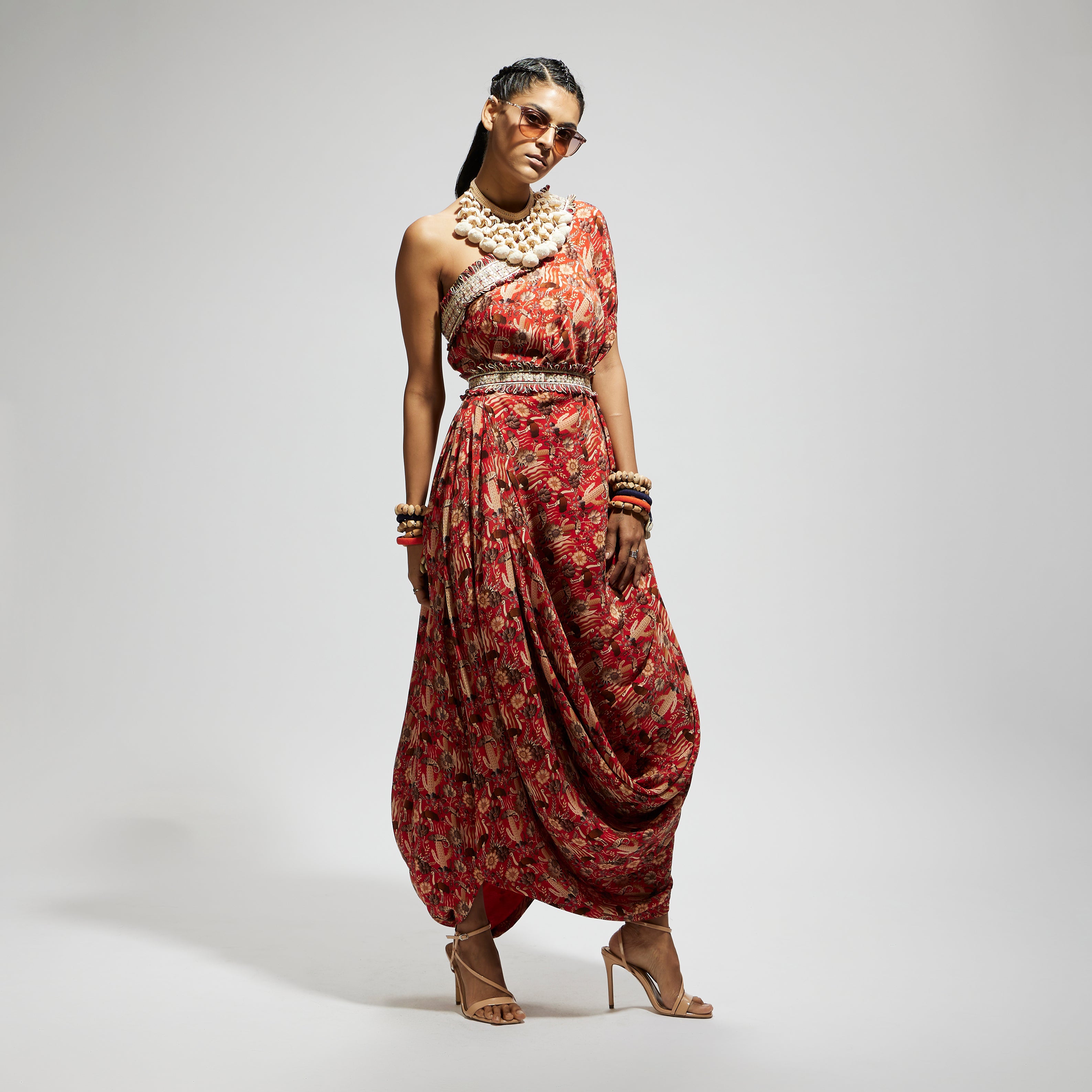 ORANGE JAAL PRINT ONE SHOULDER COWL DRESS TEAMED WITH A BELT