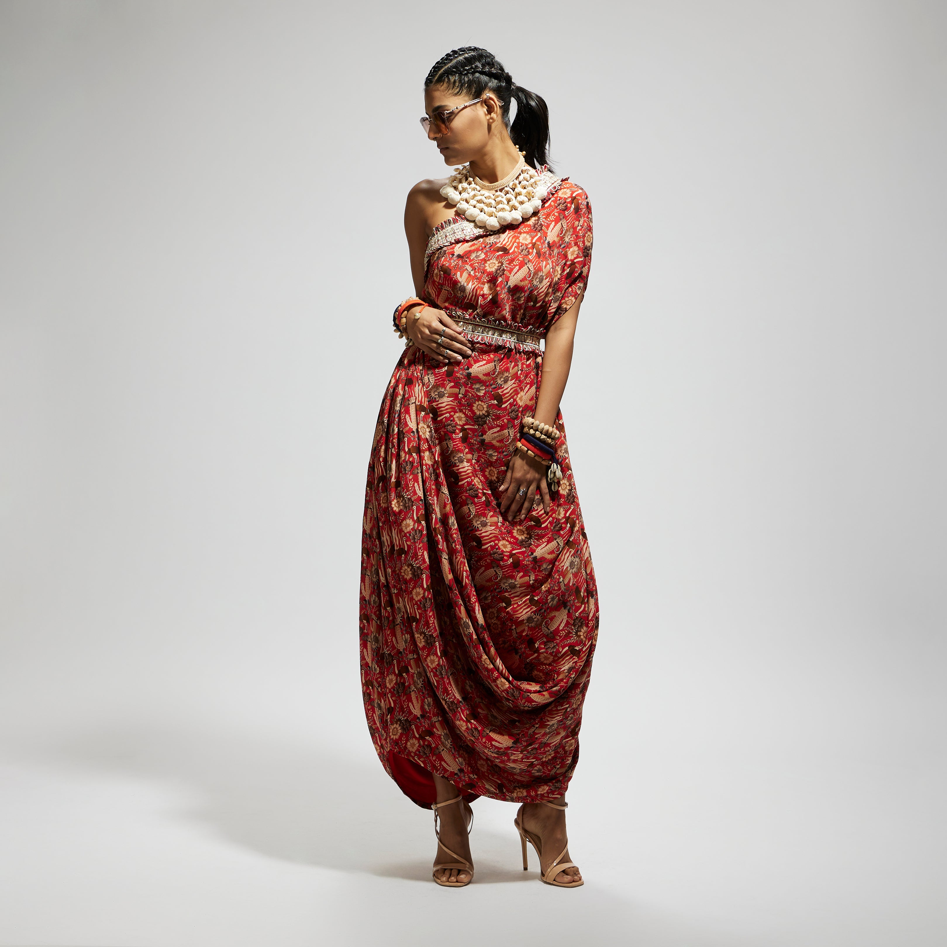 ORANGE JAAL PRINT ONE SHOULDER COWL DRESS TEAMED WITH A BELT