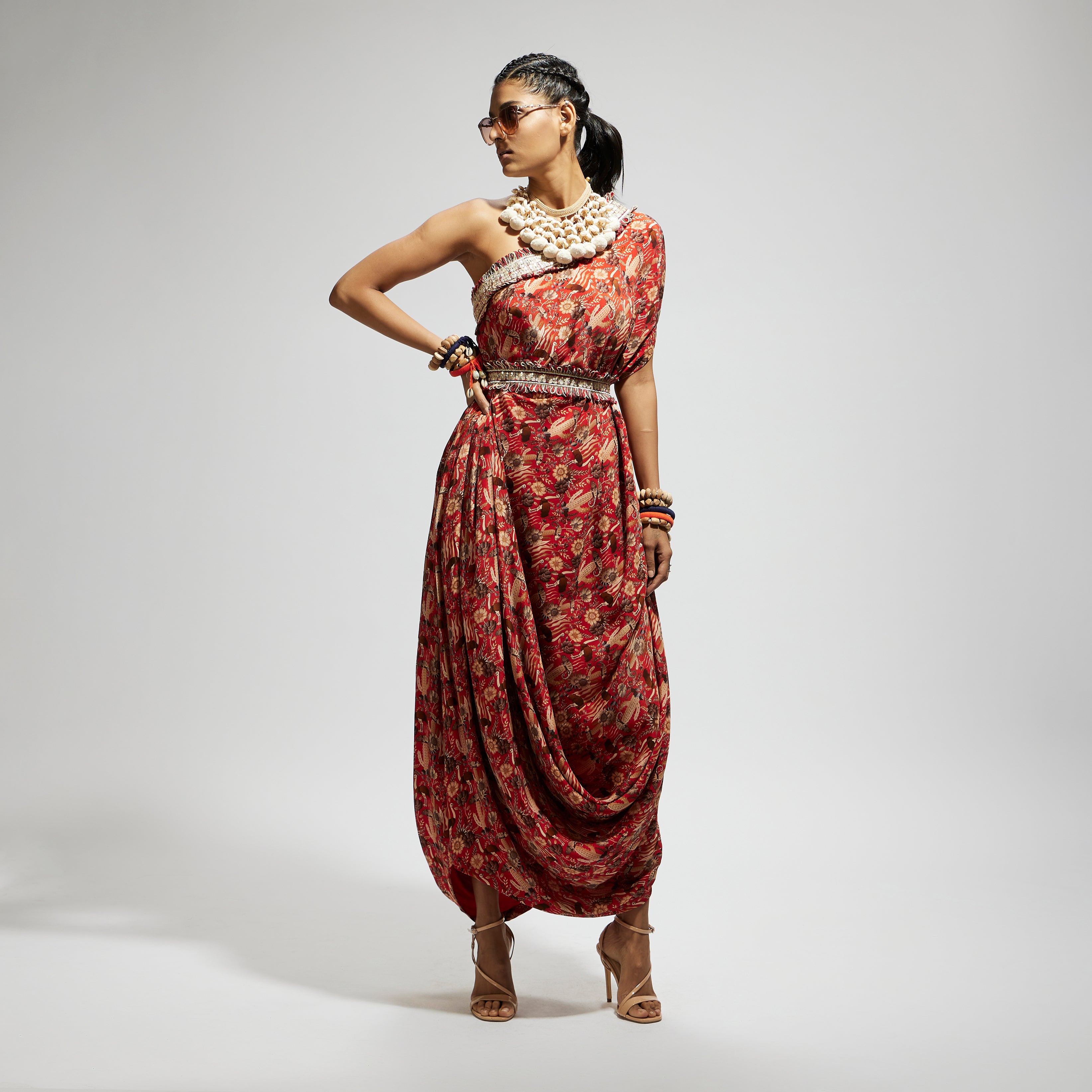 ORANGE JAAL PRINT ONE SHOULDER COWL DRESS TEAMED WITH A BELT