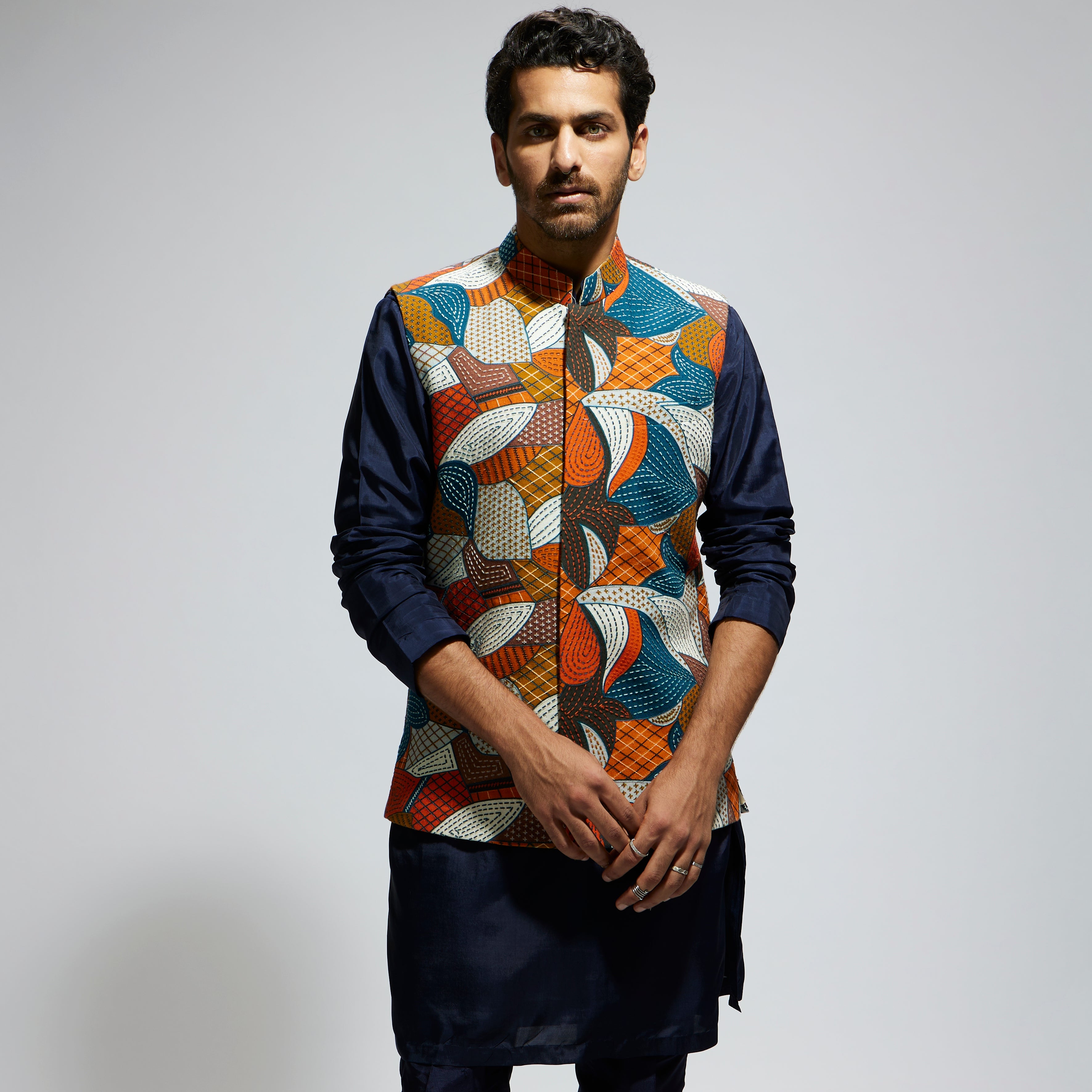 ABSTRACT BUNDI PAIRED WITH SOLID BLUE KURTA AND PANTS