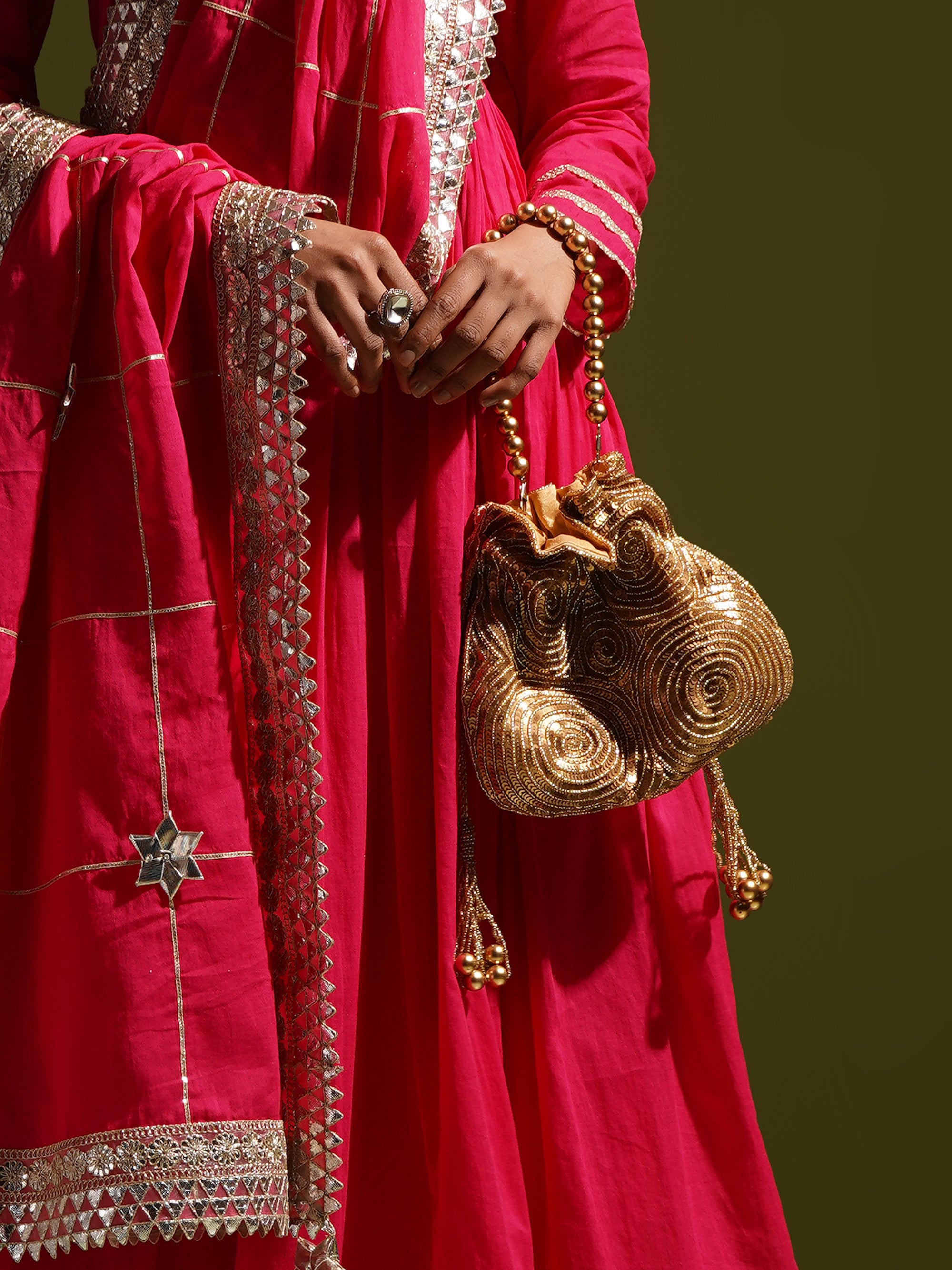 Encircle sequins Handembroidered Potli