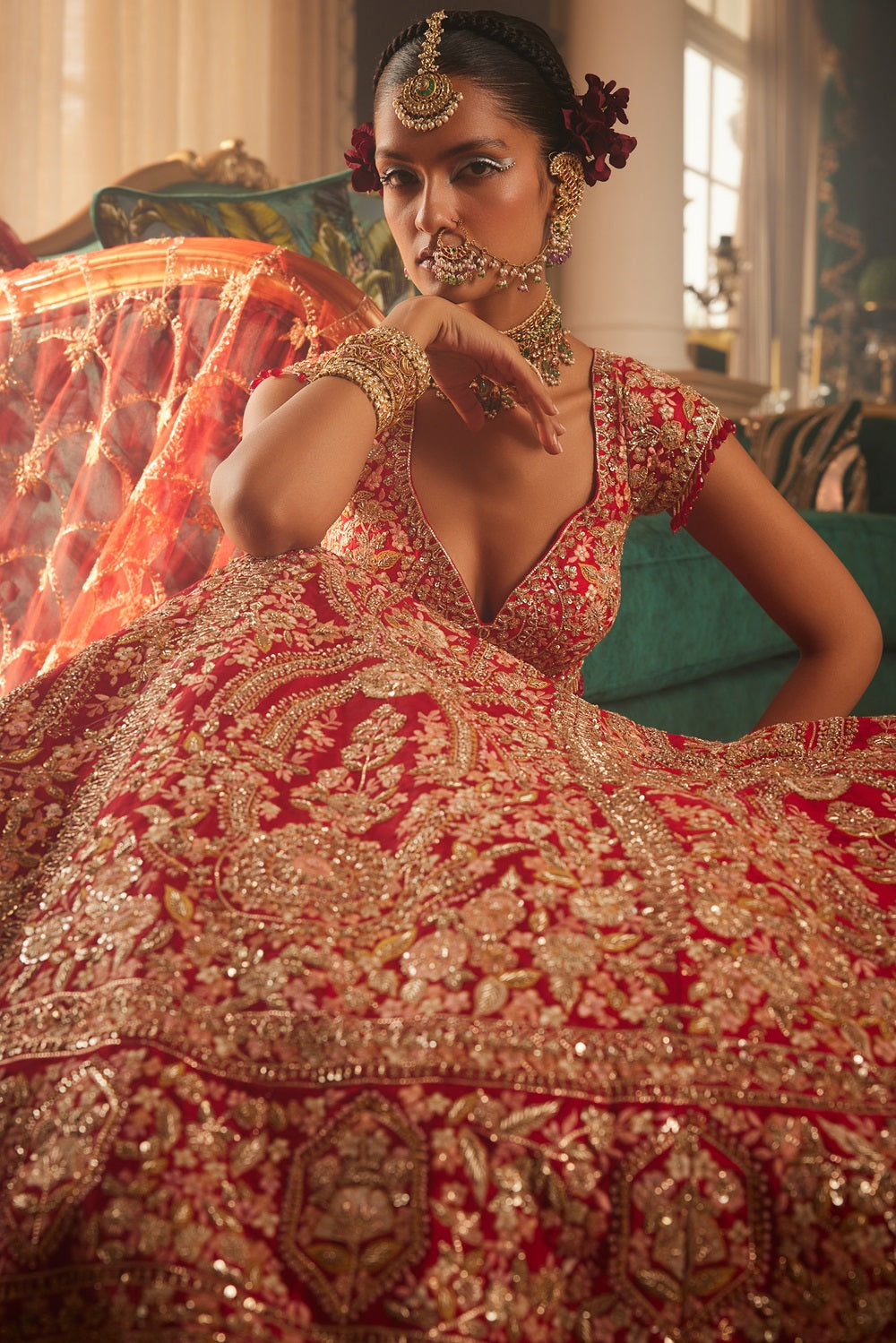 Red heavily embroidered lehenga