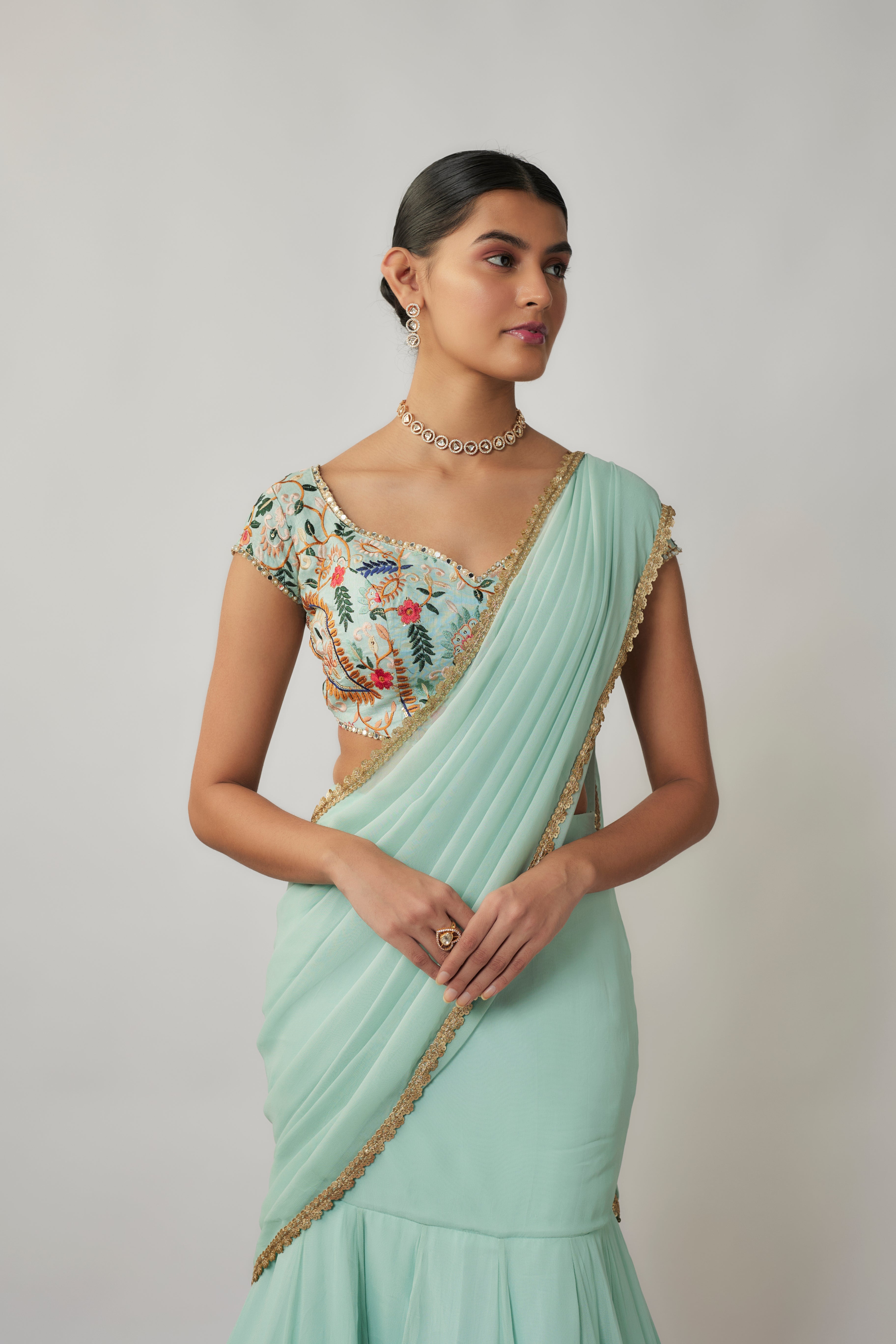 Mint and multicoloured thread embroidered pre-stitched georgette lehenga saree set