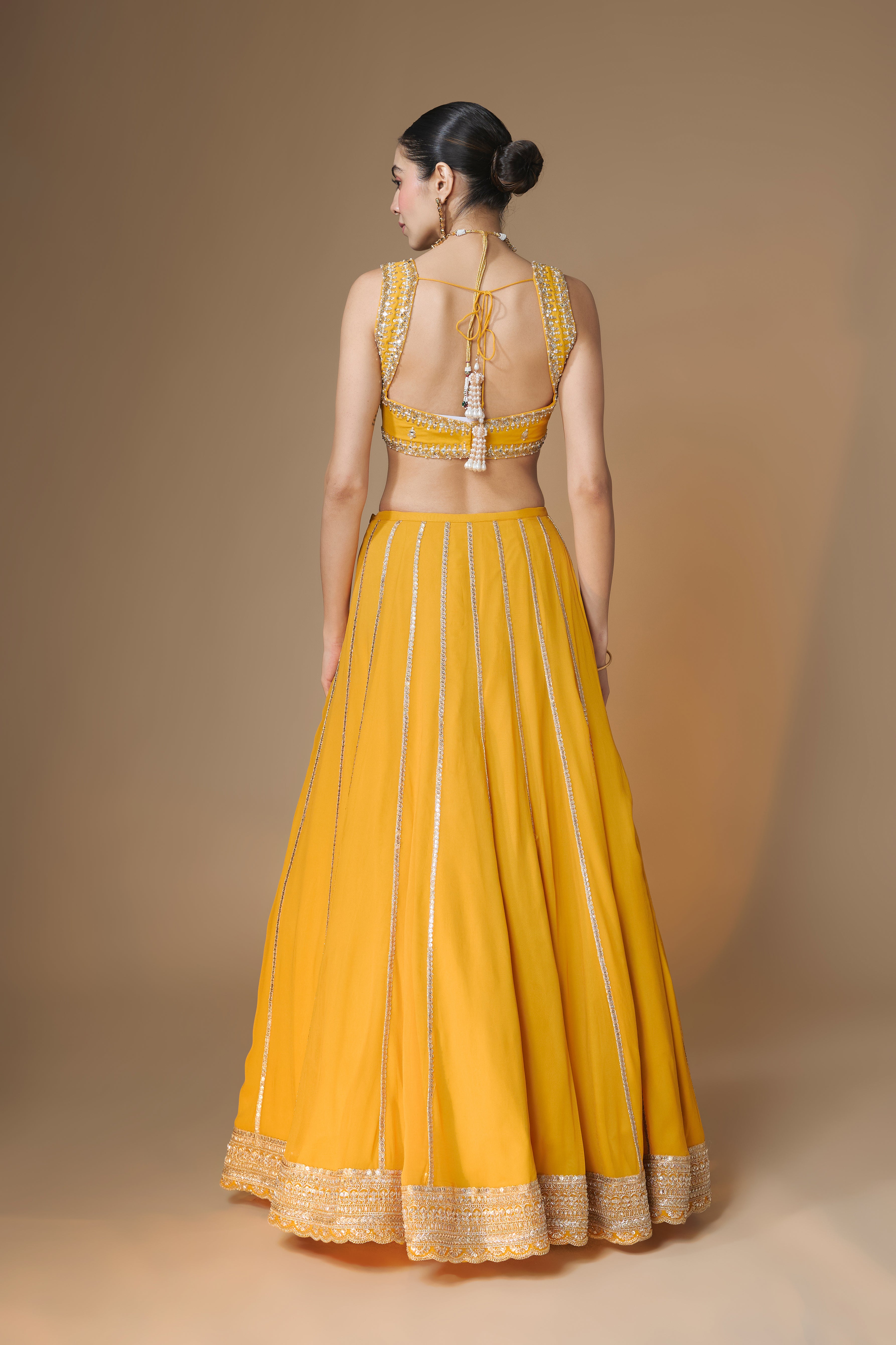 Sunset yellow embroidered corset lehenga set