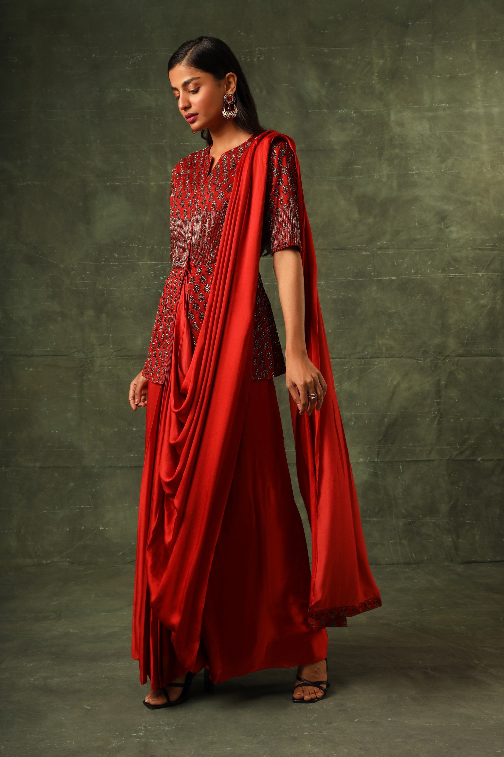 Red embellished ajrakh gown saree