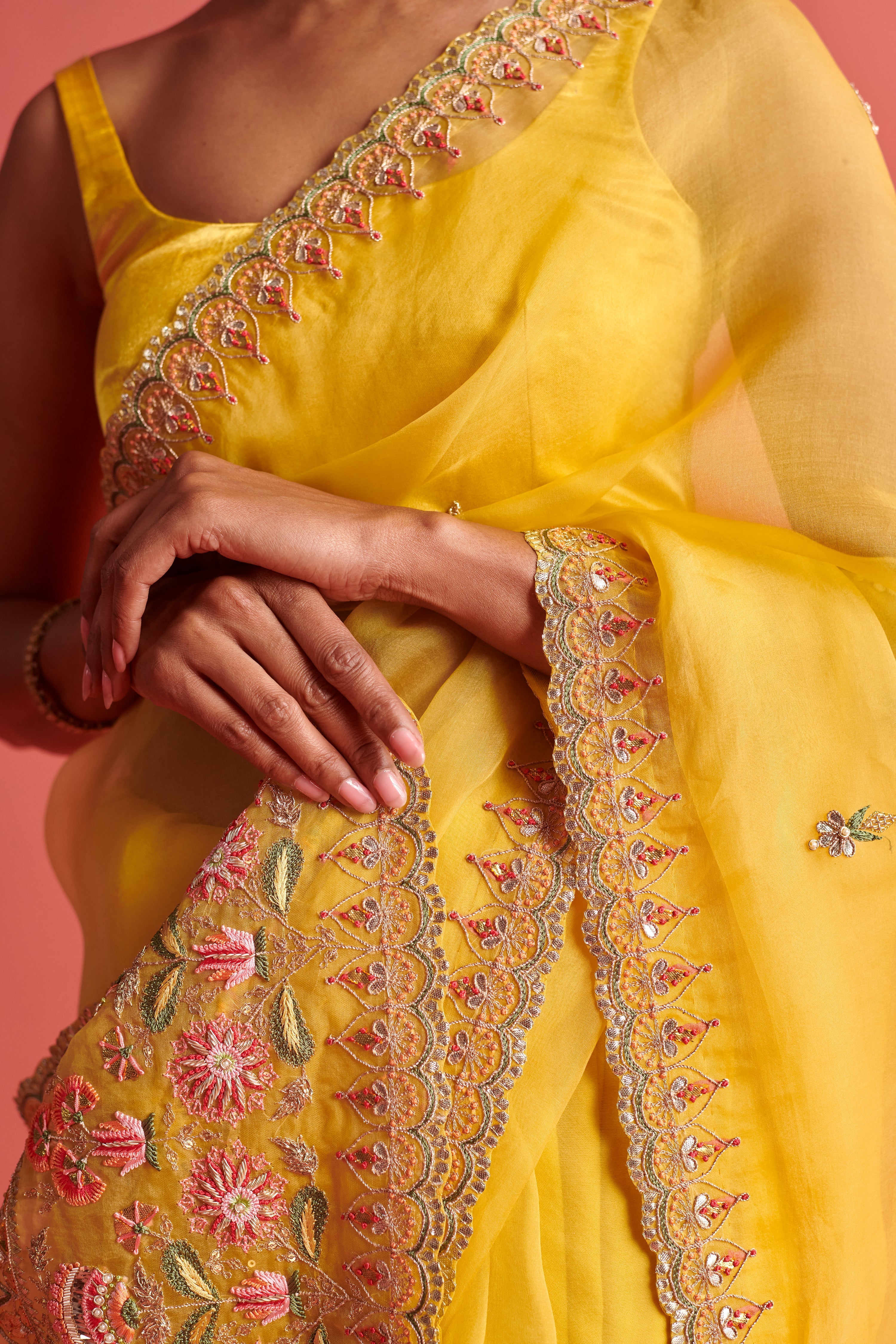 Yellow hand embrodiered saree with Mashru silk blouse