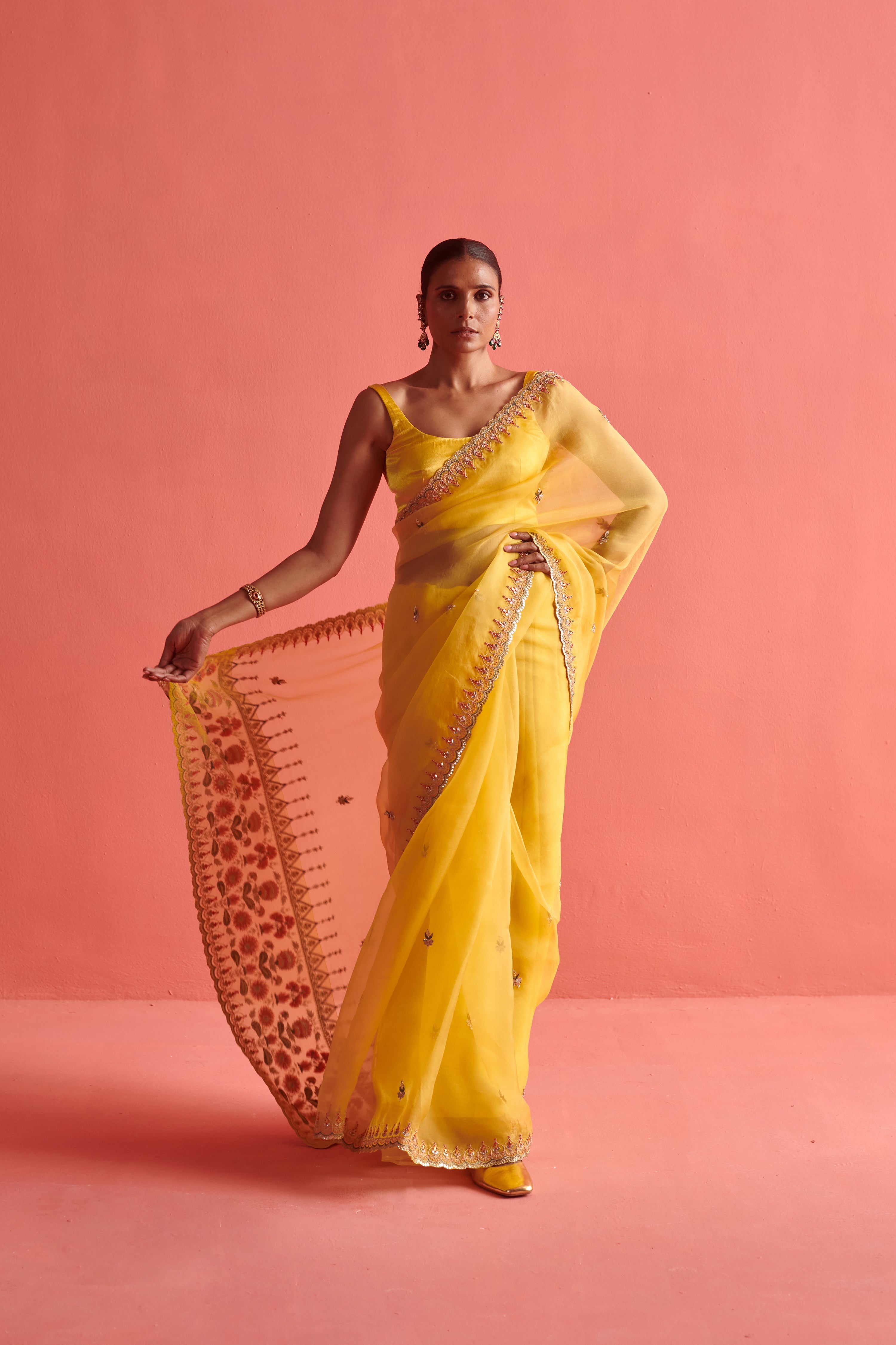 Yellow hand embrodiered saree with Mashru silk blouse