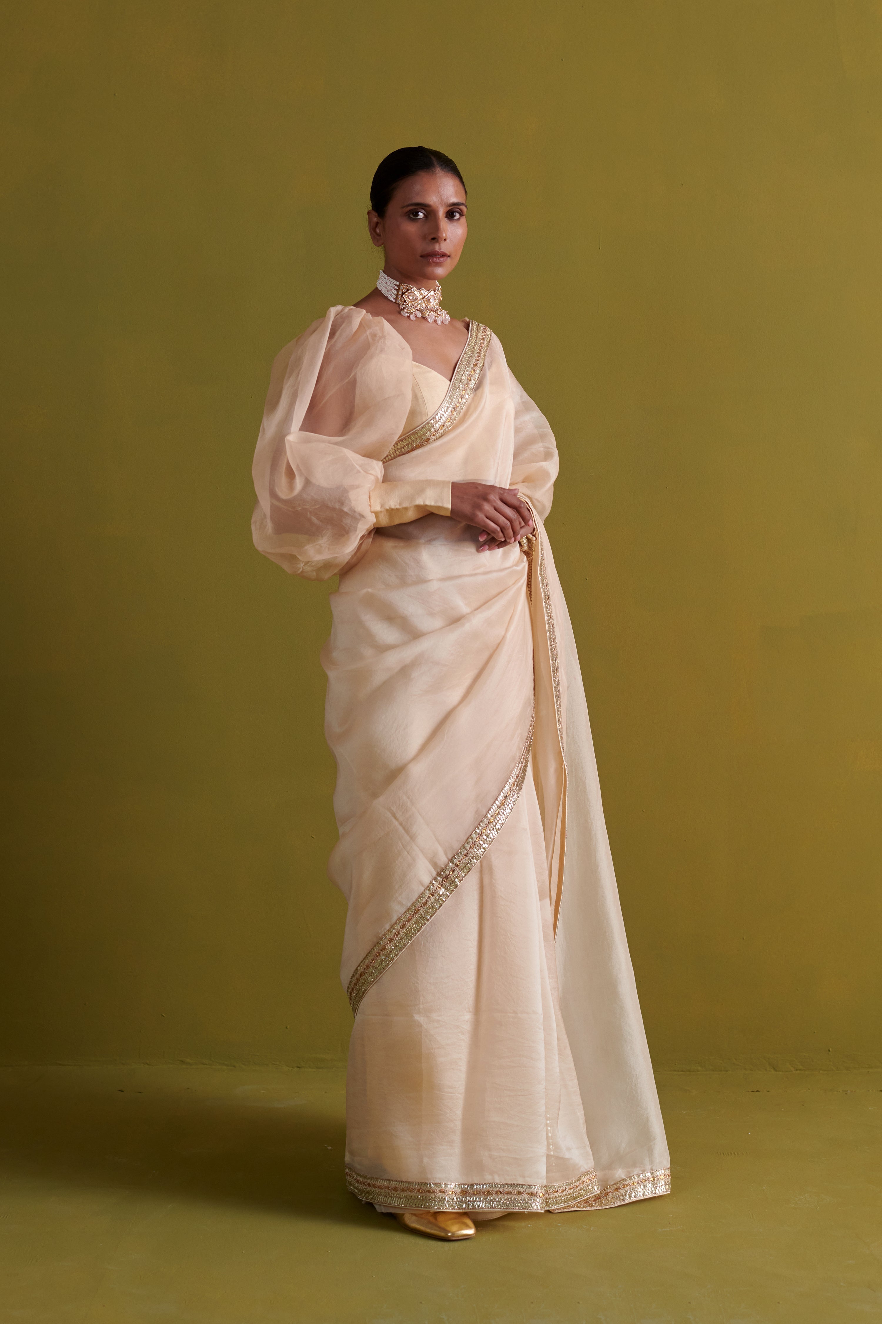 Beige hand embrodiered saree with raw silk blouse