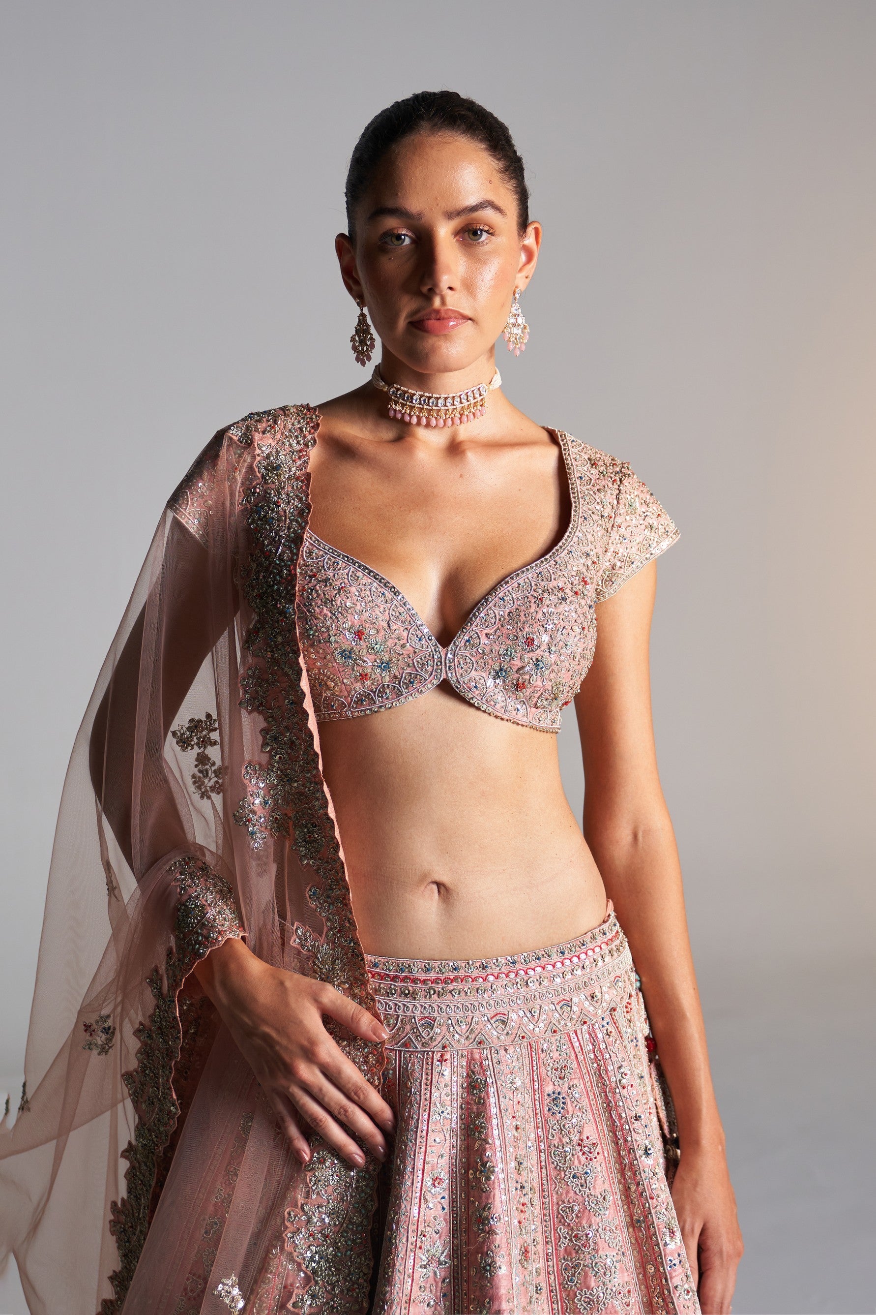 Coral rose
raw silk lehenga set