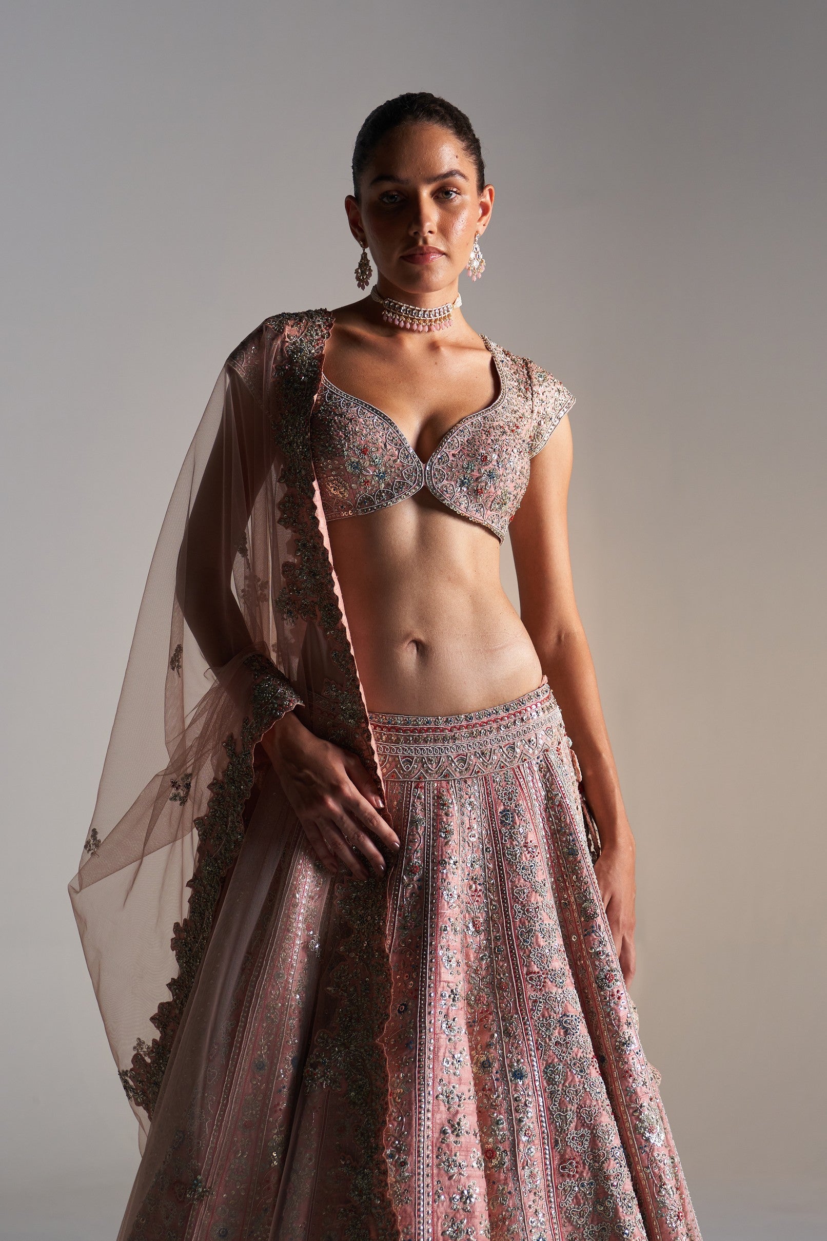 Coral rose
raw silk lehenga set